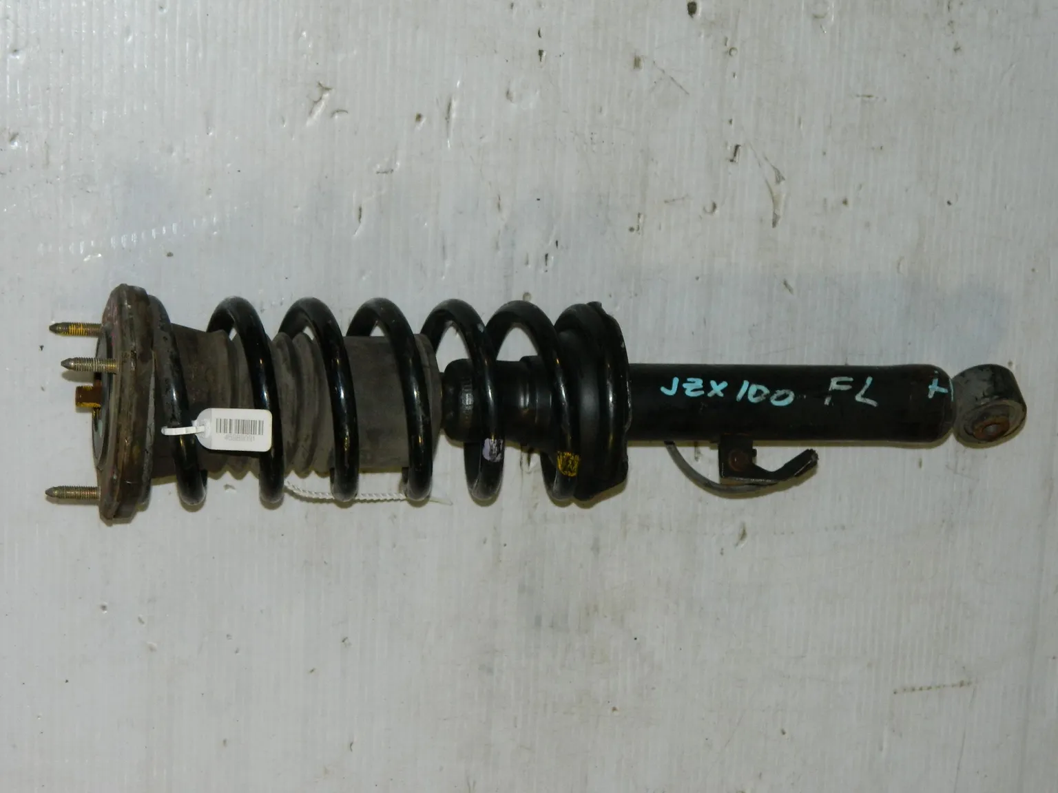 Стойка подвески TOYOTA MARK II JZX100 Перед Лев (Контрактный)