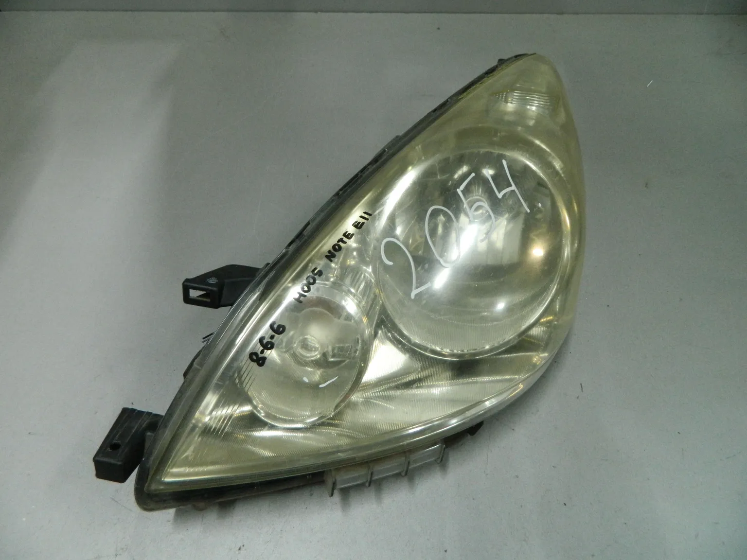 Фара NISSAN NOTE E11 Перед Лев H005 (Контрактный) 03344005