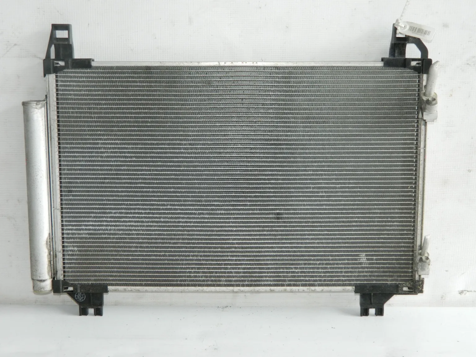 Радиатор кондиционера TOYOTA RACTIS NCP100 1NZ (Контрактный) 45984818