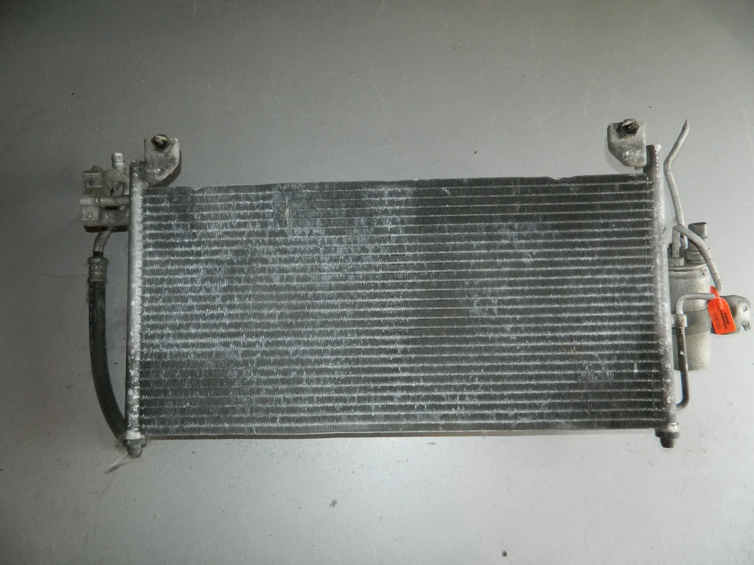 Радиатор кондиционера MAZDA FAMILIA BJ5W (Контрактный) 72367308