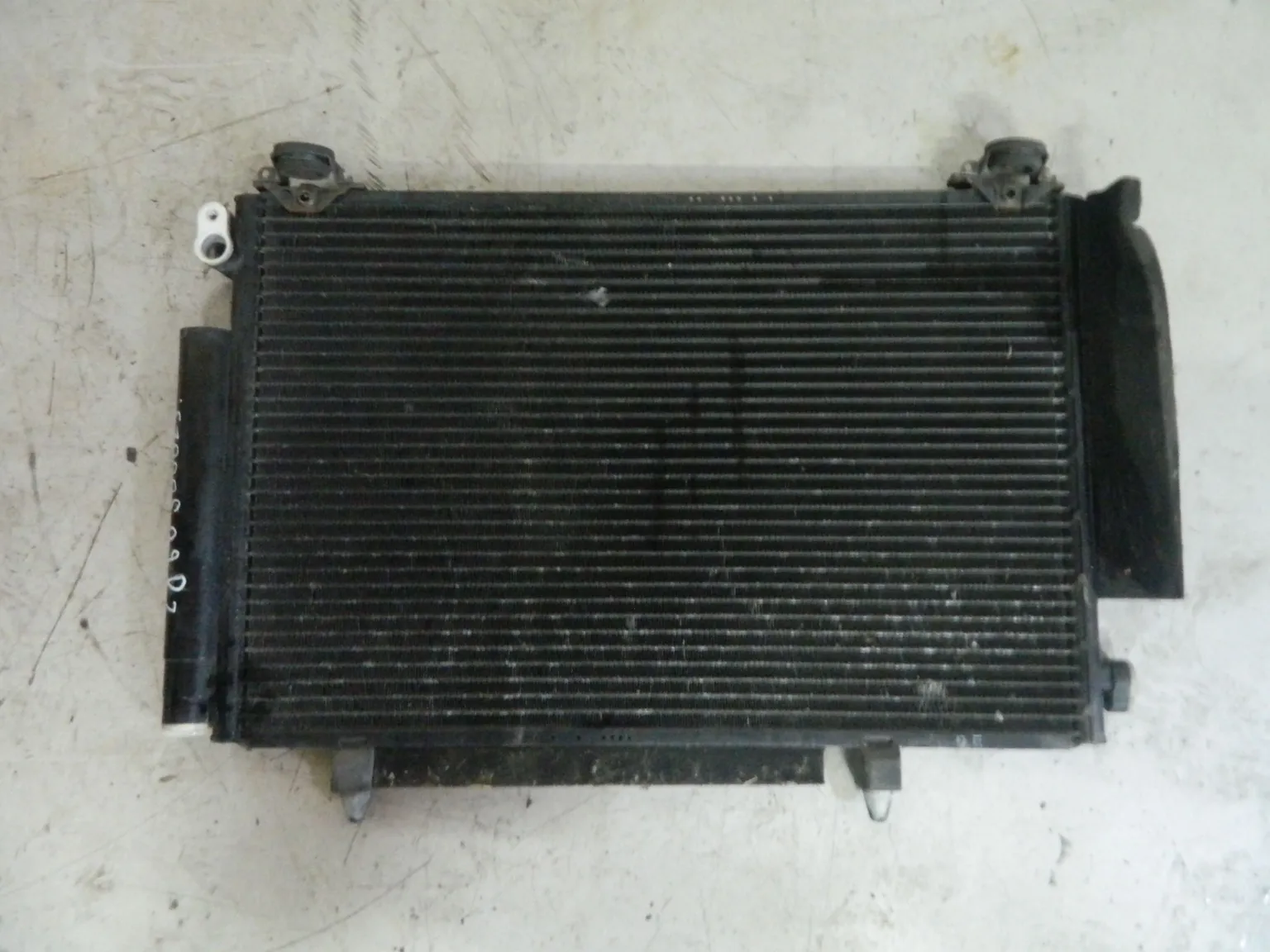 Радиатор кондиционера TOYOTA PLATZ NCP12 (Контрактный) 2860300023