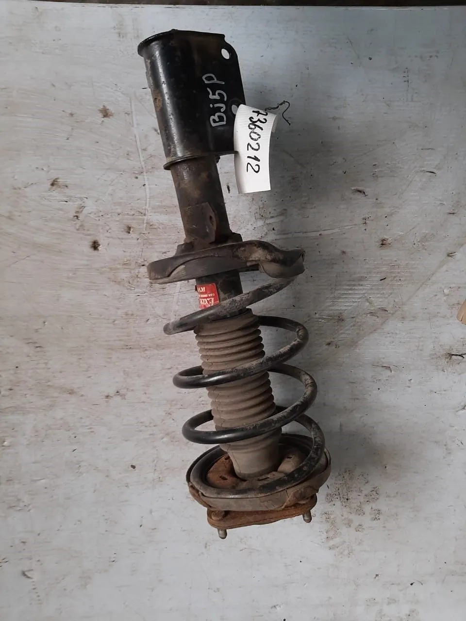 Стойка подвески MAZDA FAMILIA BJ5P Перед Лев (Контрактный) 45984394