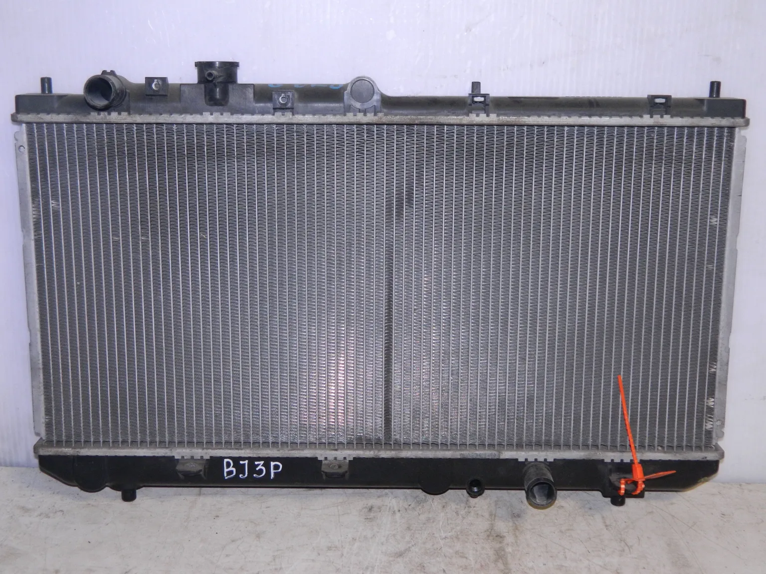 Радиатор ДВС MAZDA FAMILIA BJ3P (Контрактный) 65243479