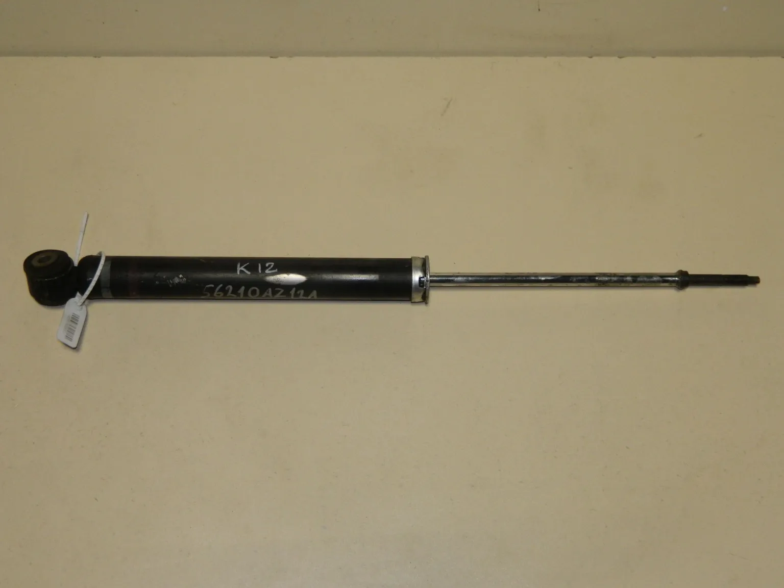 Амортизатор NISSAN MARCH K12 Зад (Контрактный) 45976500