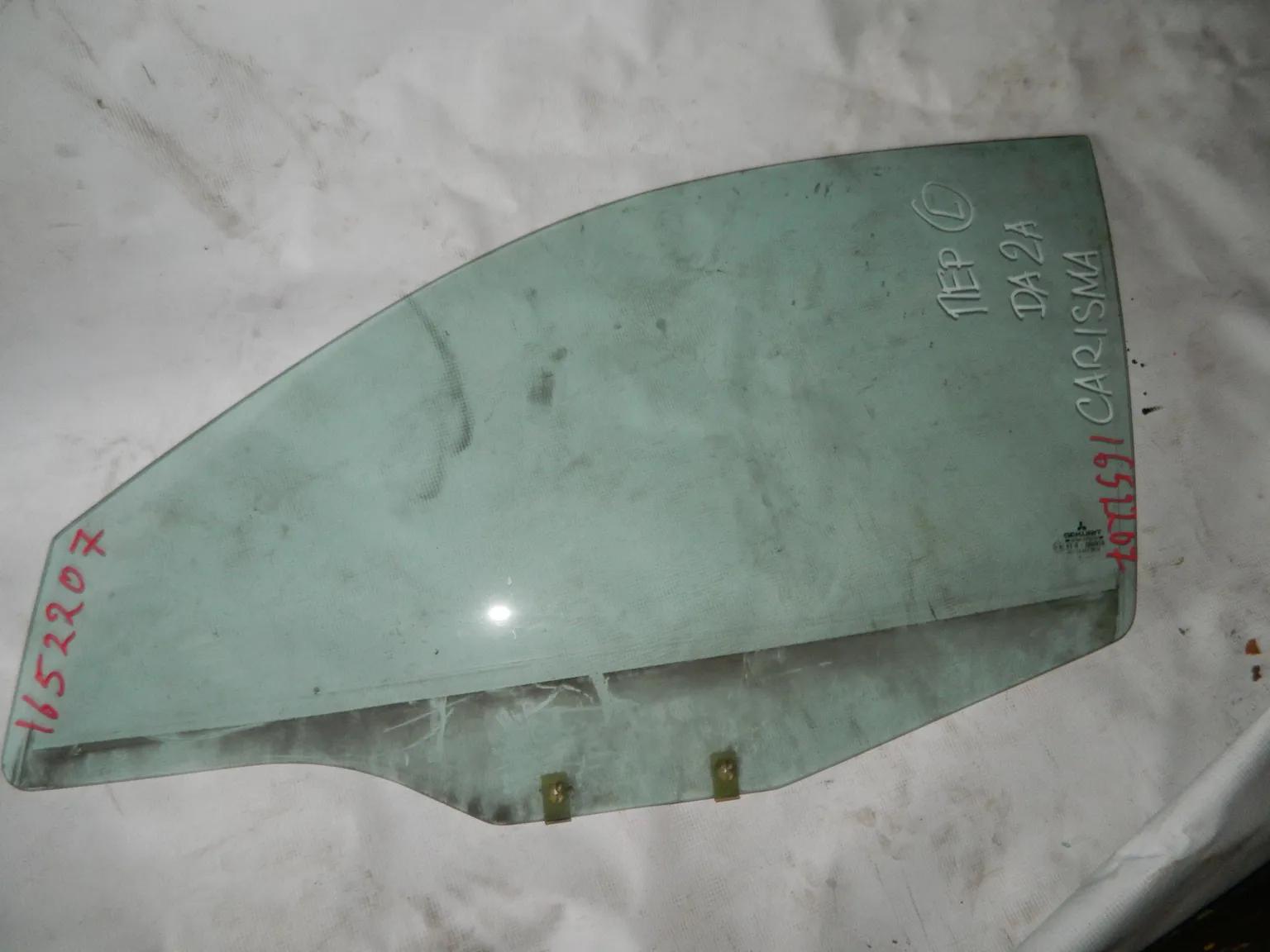 Стекло двери MITSUBISHI CARISMA Перед. Лев (Контрактный) 1652207