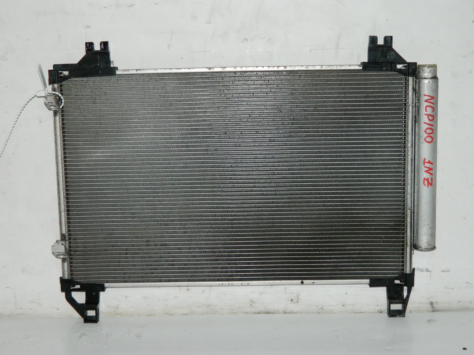 Радиатор кондиционера TOYOTA RACTIS NCP100 1NZ (Контрактный) 45984827