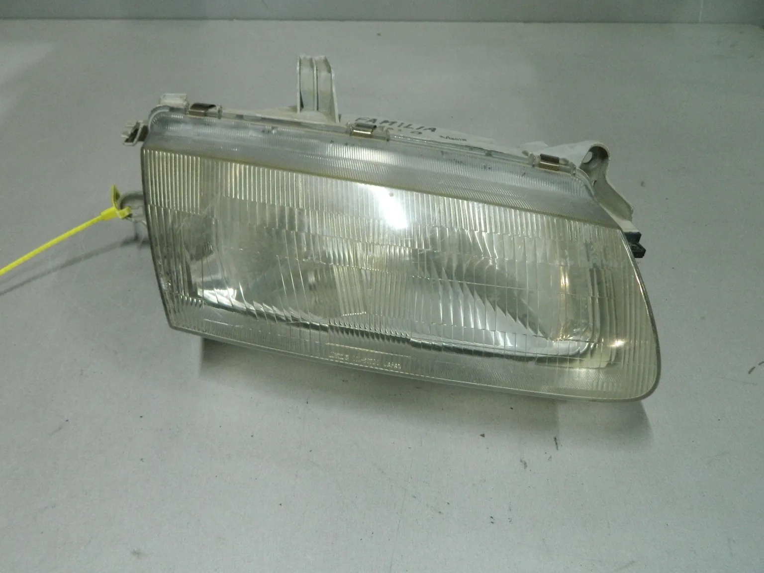 Фара MAZDA FAMILIA BHALP Перед Прав (Контрактный) 64492546