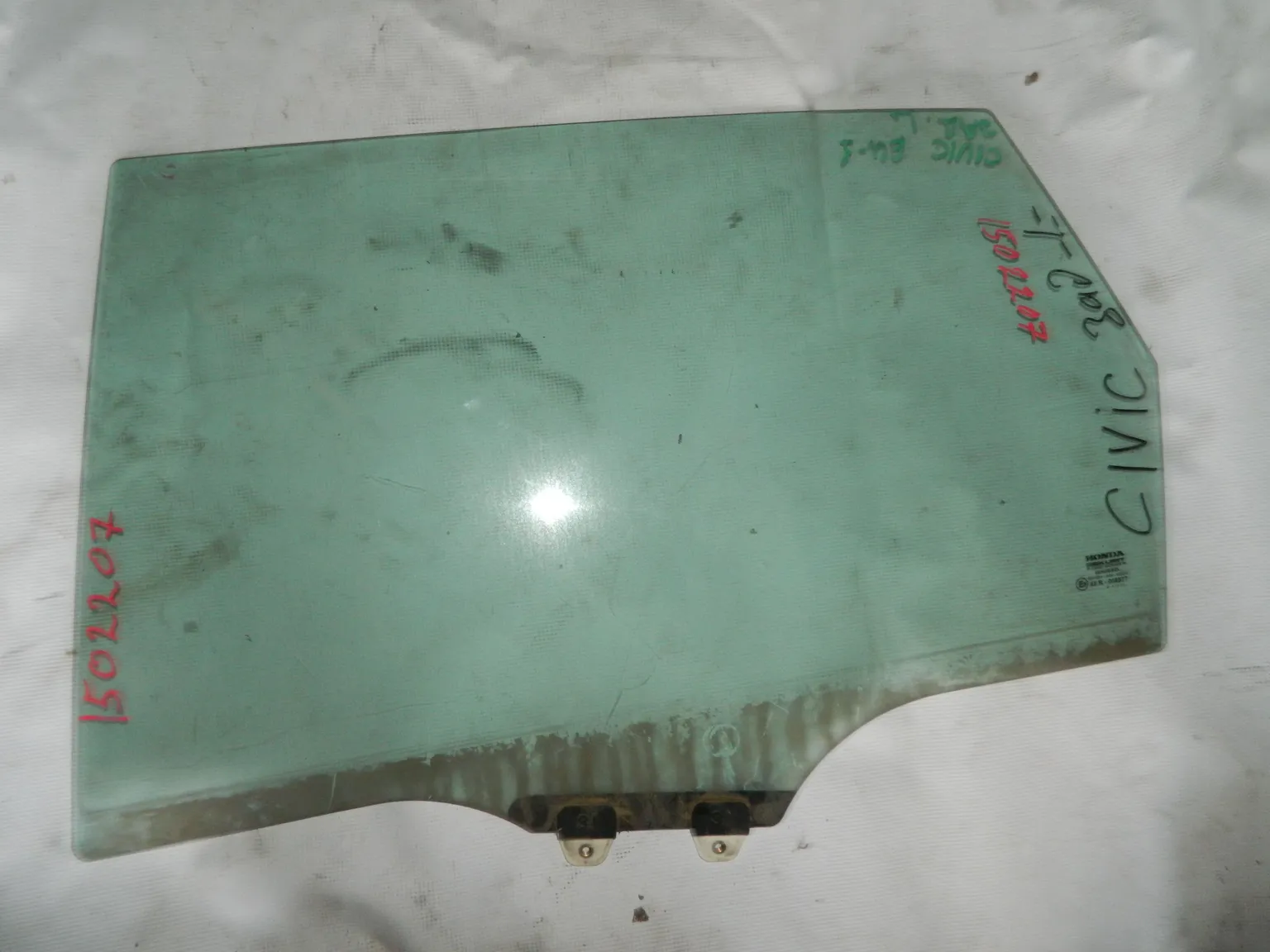 Стекло двери HONDA CIVIC EU1 Задн. Лев (Контрактный) 1502207