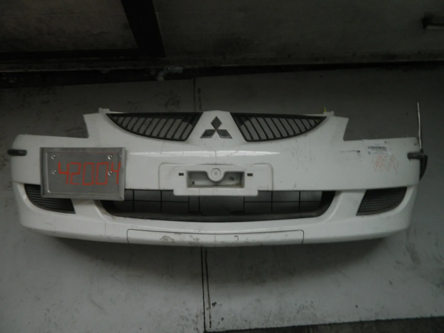 Бампер передний MITSUBISHI LANCER 9 (Контрактный) 94603686