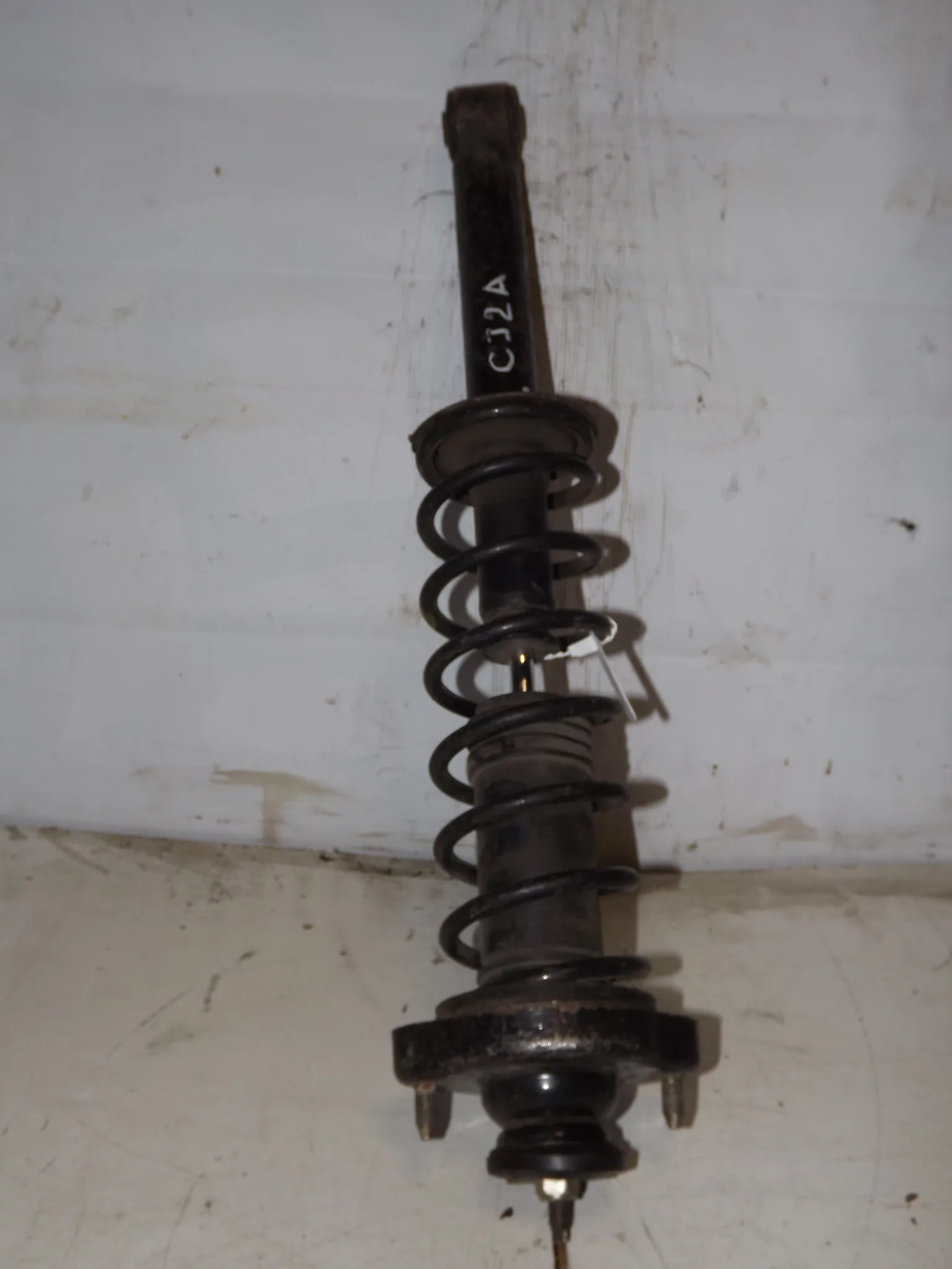 Стойка подвески MITSUBISHI MIRAGE CA3A Зад (Контрактный) 35023514 MR197611