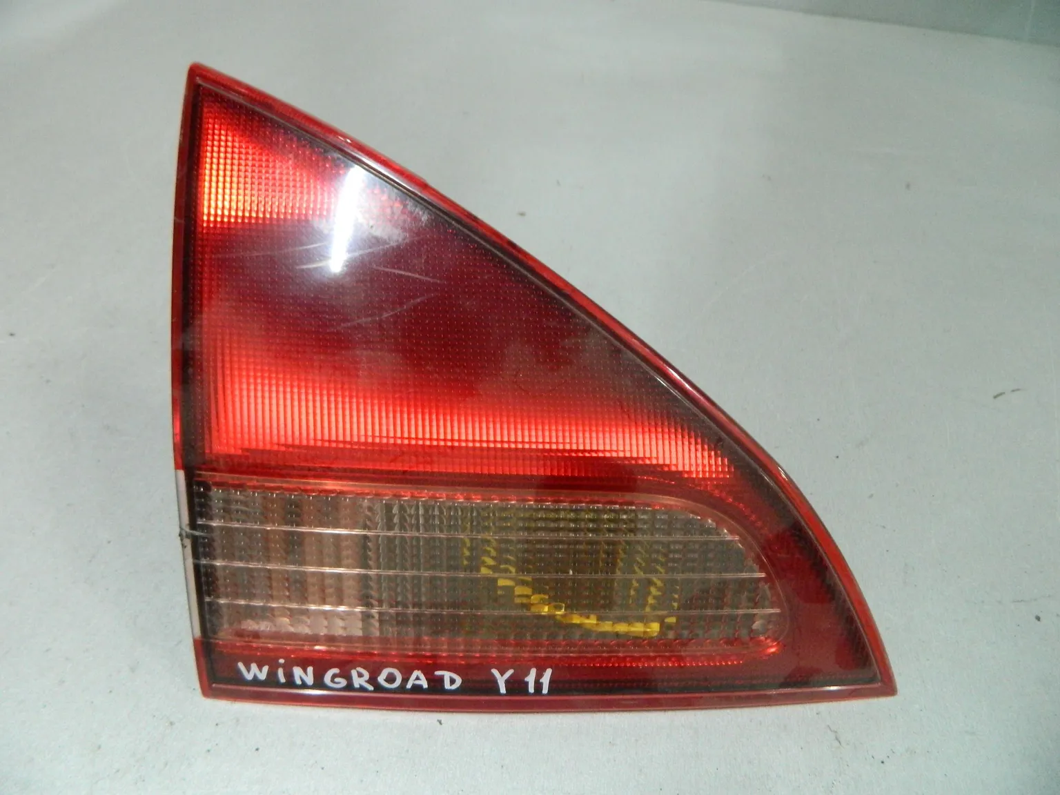 Фонарь NISSAN WINGROAD WFY11 Зад Лев (Контрактный) 64492051