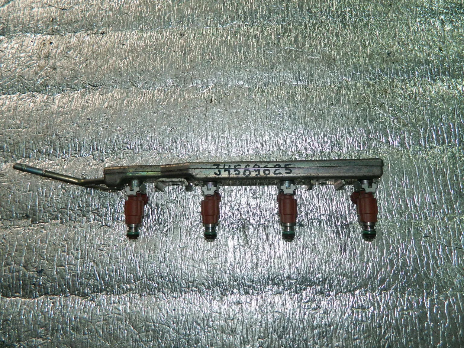 Рампа топливная с форсунками NISSAN PRIMERA P12 (Контрактный) 34569625