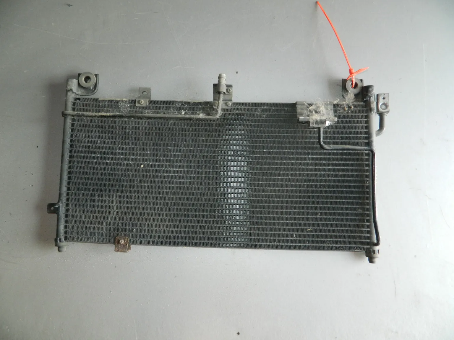 Радиатор кондиционера MAZDA FAMILIA BHALP (Контрактный) 72367306