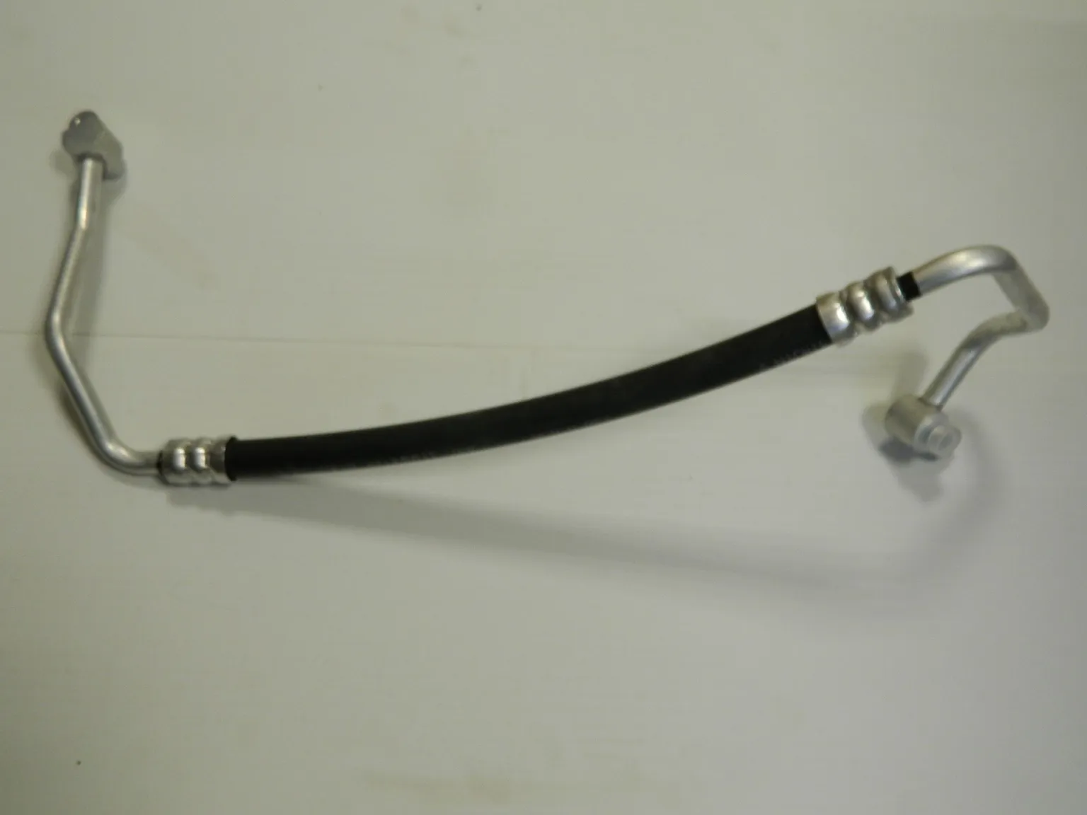 Трубка кондиционера JORDEN JH02ACT11083 HYUNDAI SOLARIS / KIA RIO IV (короткая)