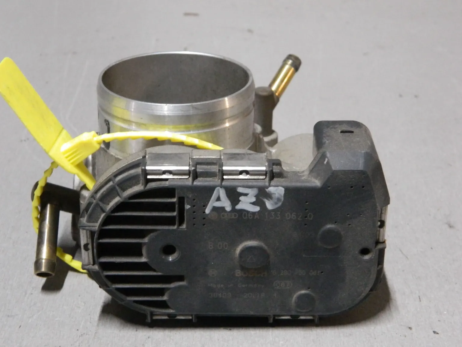 Дроссельная заслонка VOLKSWAGEN AZJ (Контрактный) 79780603