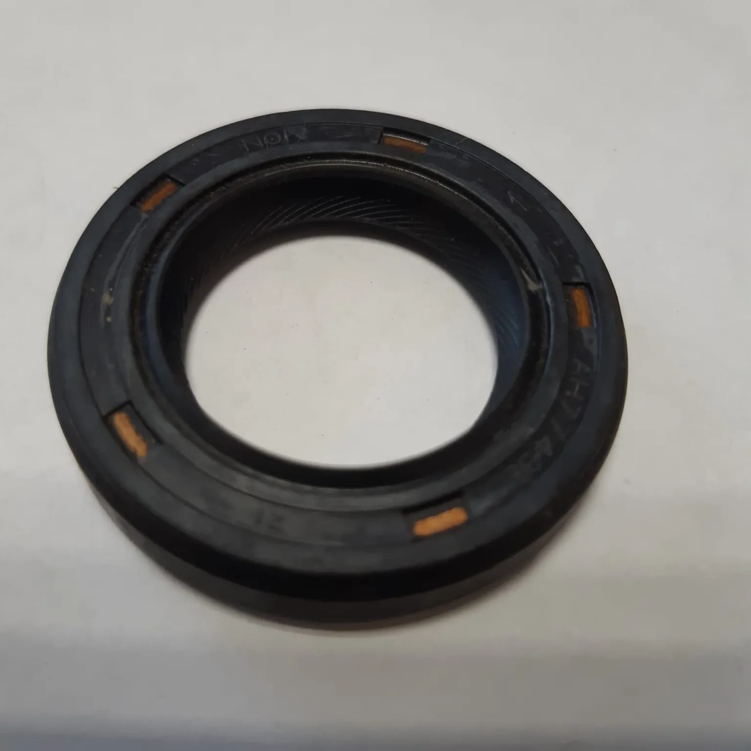 Сальник NOK AH7743E0 HONDA Accord,Civic 26x42x7 91216PL3005