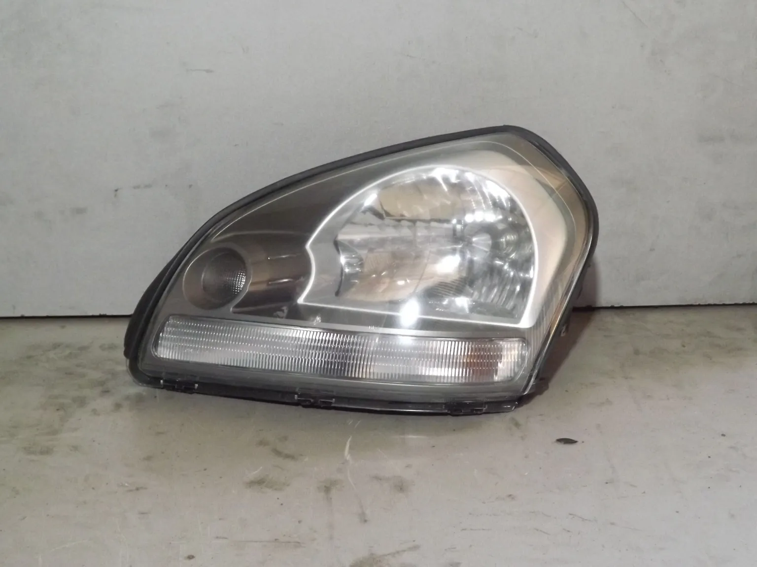 Фара ATB 1AHT1080L HYUNDAI TUCSON I 2004-2010 (под эл. кор) Лев