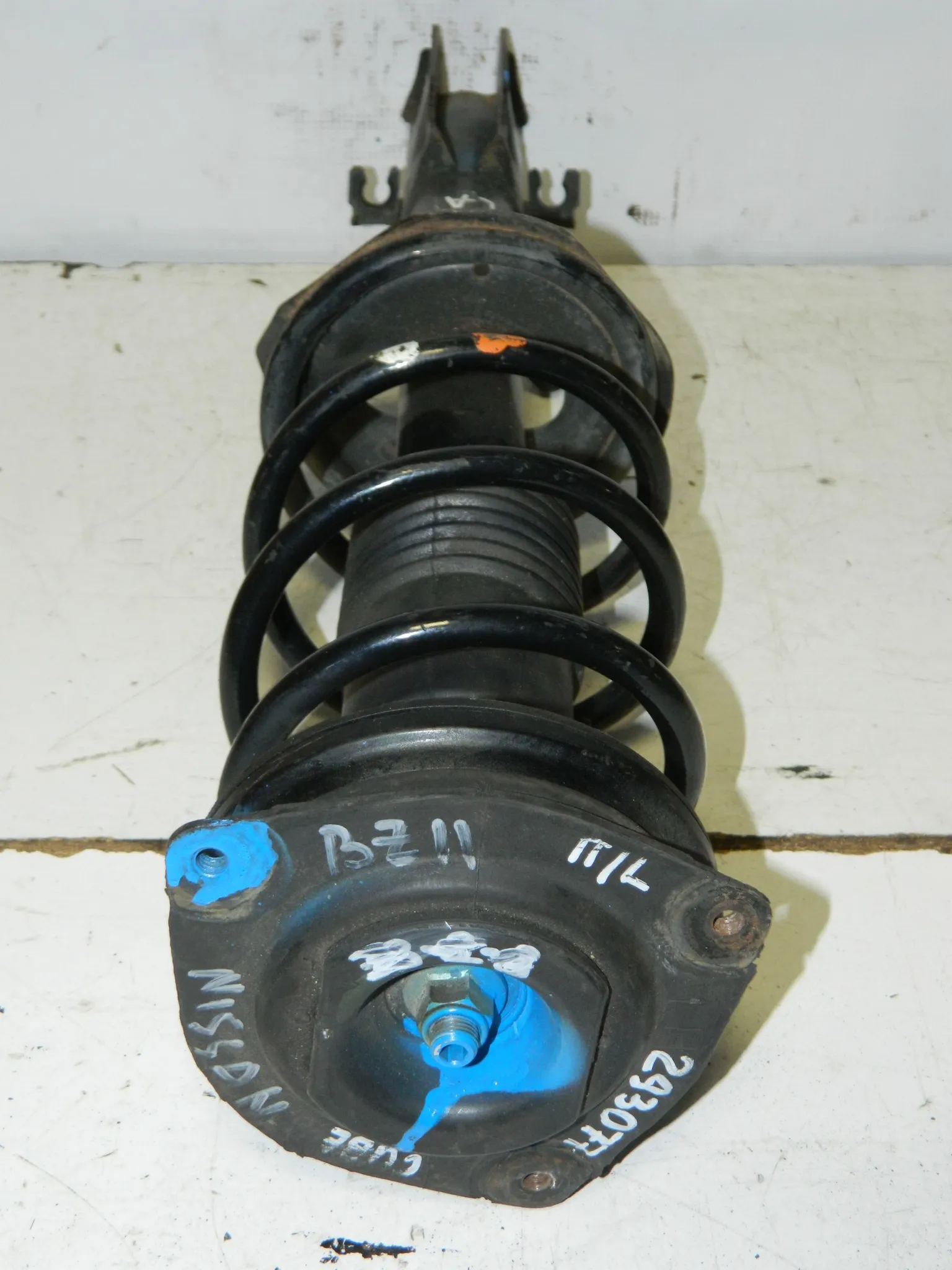 Стойка подвески NISSAN CUBE Z11 Перед Лев (Кoнтрактный) 45989502 54303AX002