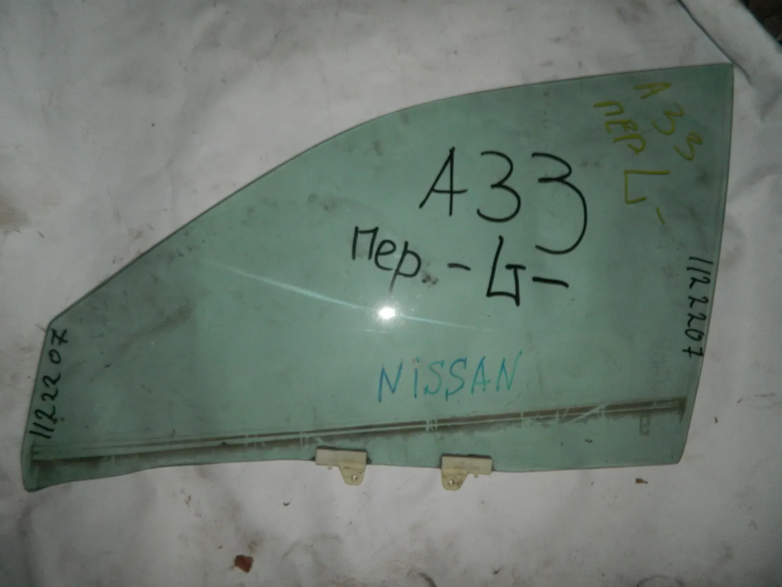 Стекло двери NISSAN CEFIRO A33 Перед. Лев (Контрактный) 1112207 K1