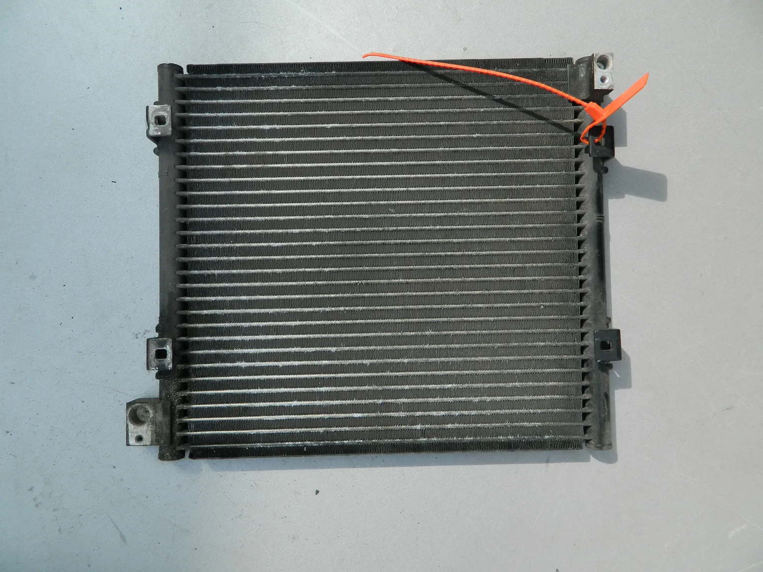Радиатор кондиционера HONDA LOGO GA3 (Контрактный) 72367771