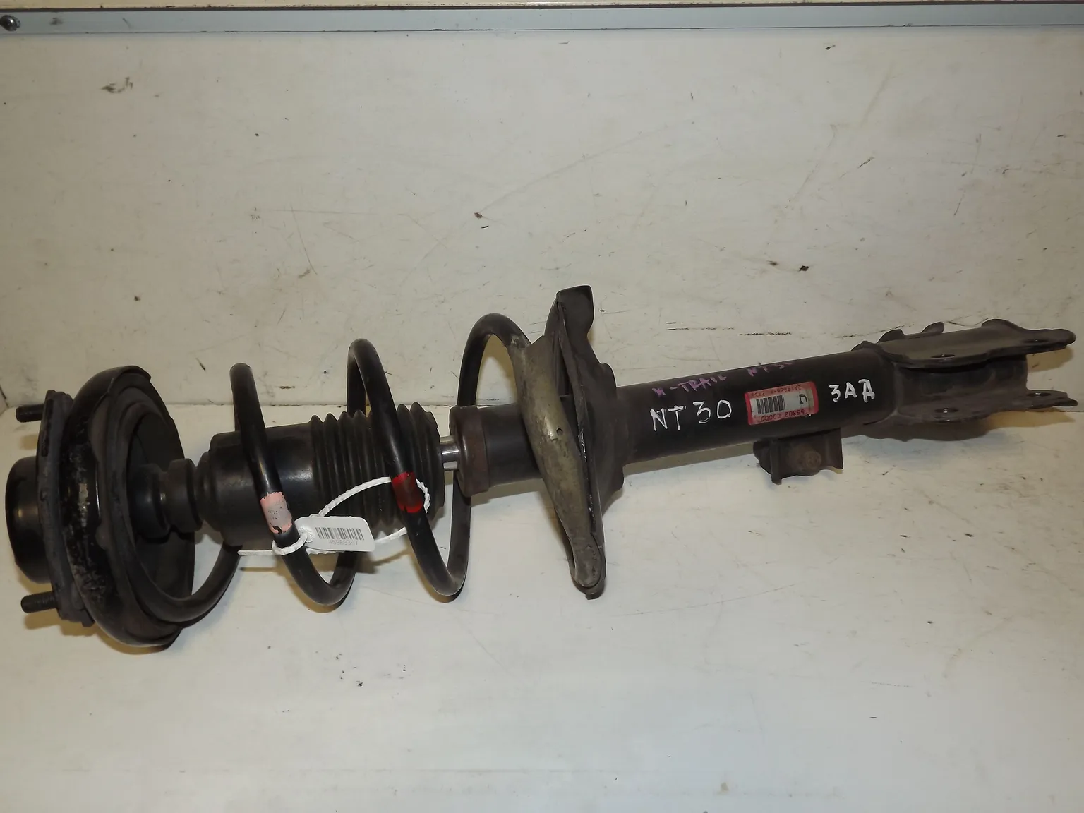 Стойка подвески NISSAN X-TRAIL NT30 Зад Лев (Контрактный) 45989357 55303EQ100