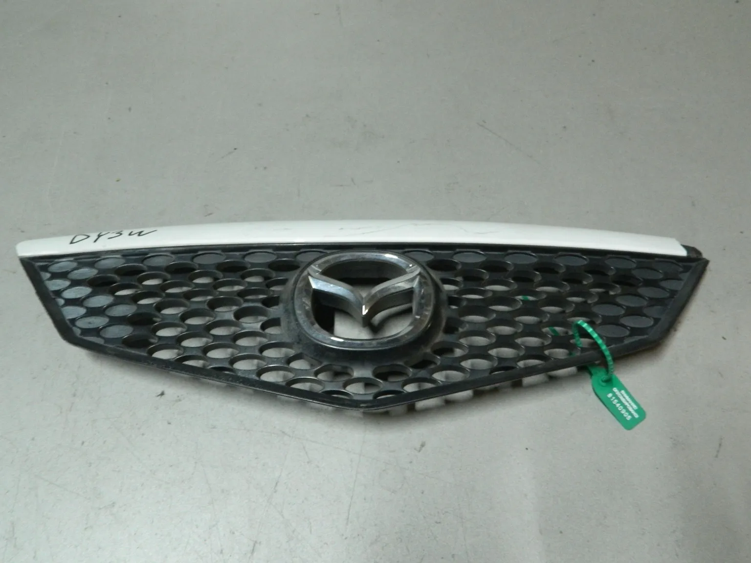Решетка радиатора MAZDA DEMIO DY3W (Контрактный) 81540905
