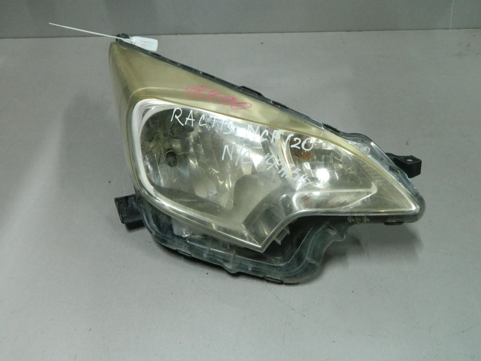 Фара TOYOTA RACTIS NCP120 Перед Прав 52211 (Контрактный) 03344713