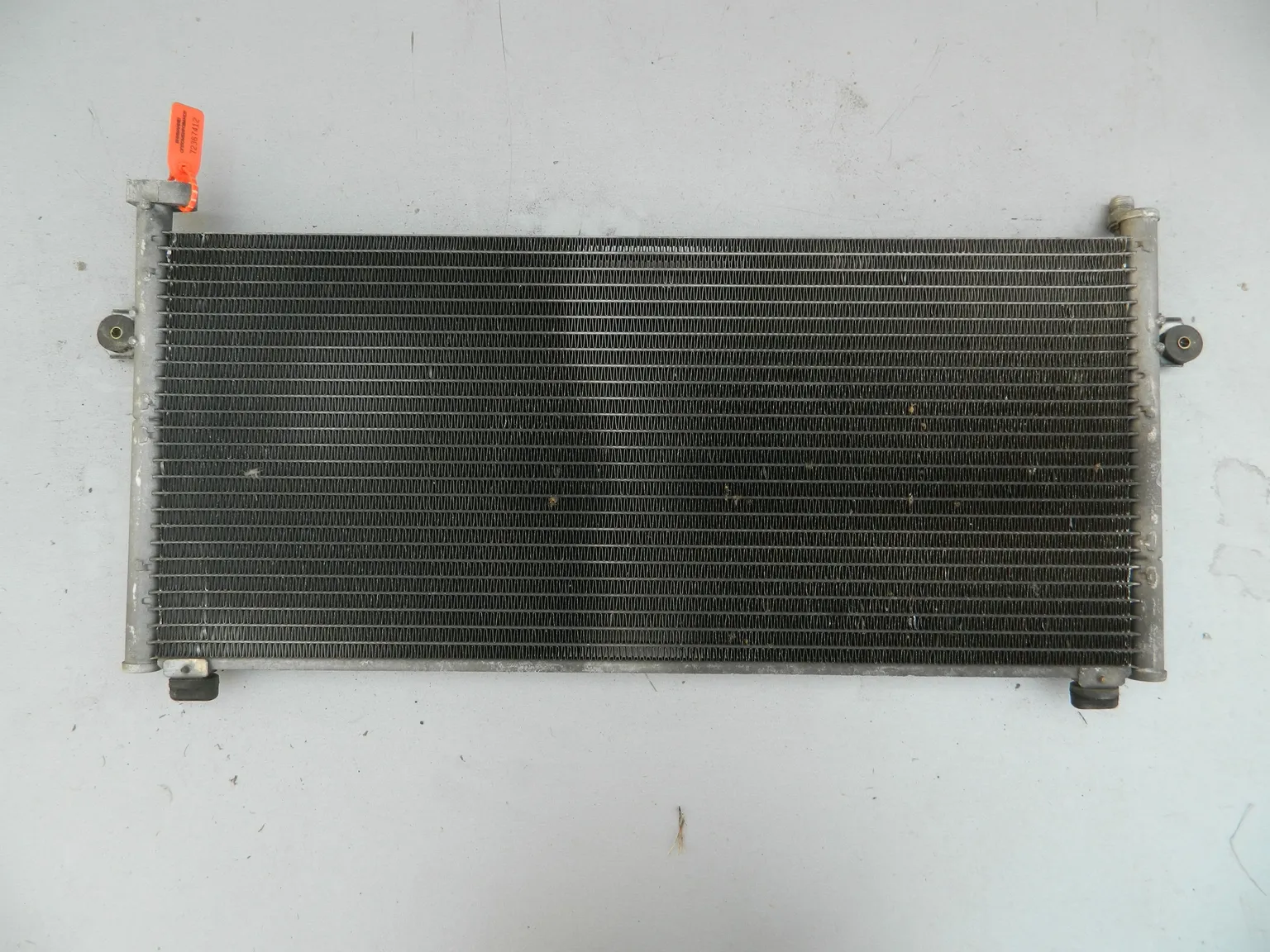 Радиатор кондиционера NISSAN CUBE AZ10 (Контрактный) 72367412 92100AN000
