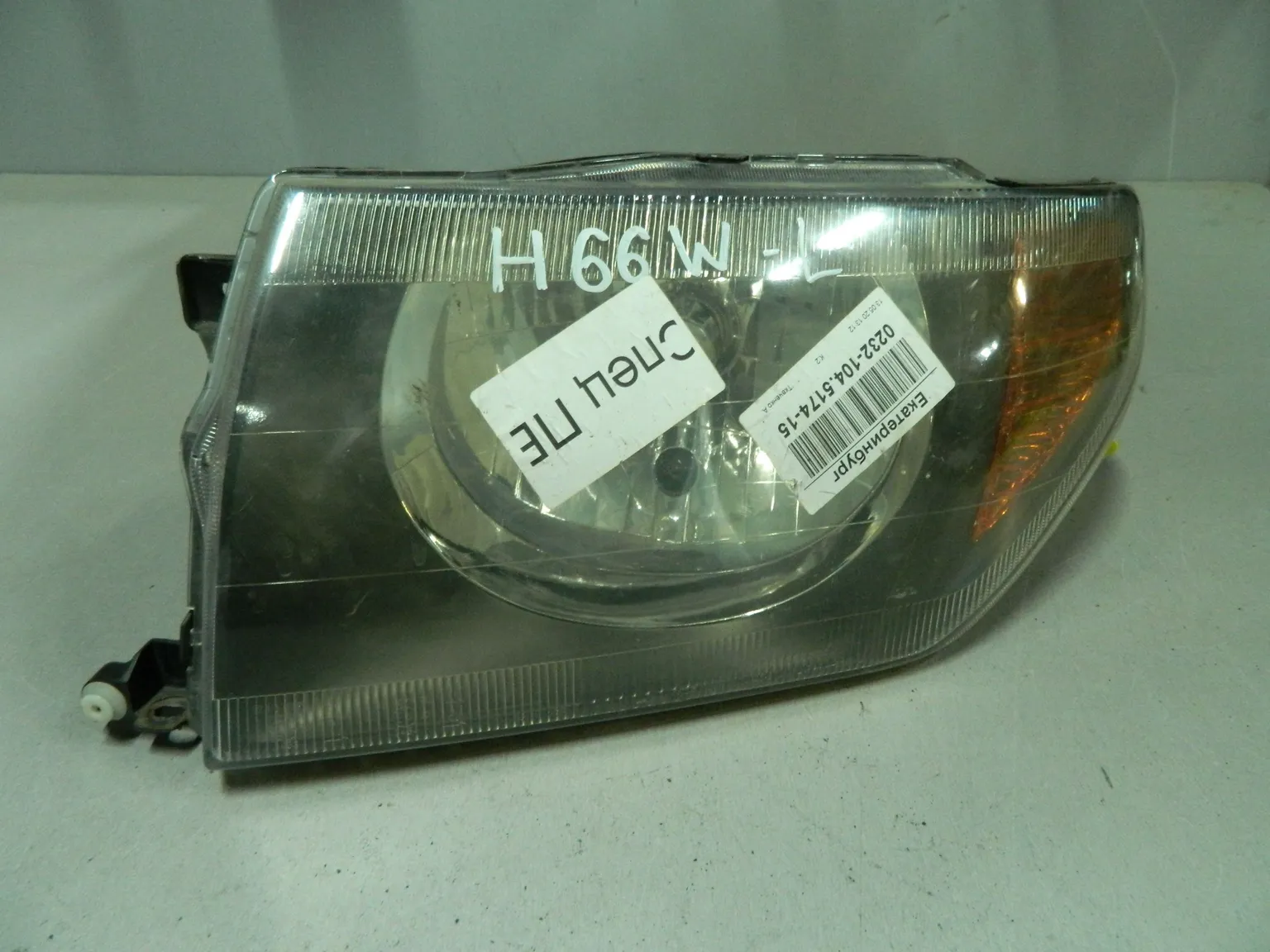 Фара MITSUBISHI PAJERO IO H76W Перед Лев (Контрактный) 64492418
