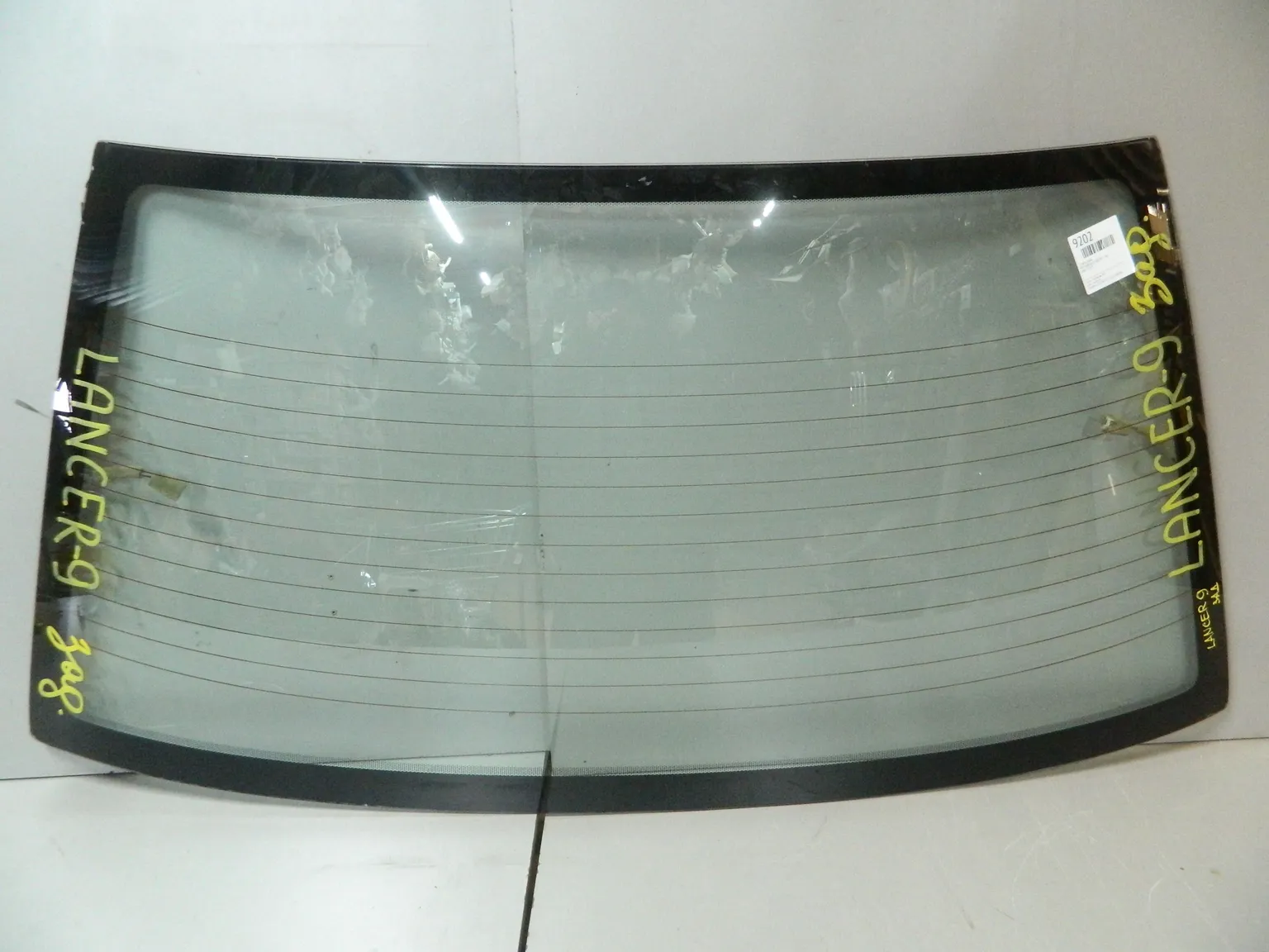 Стекло заднее MITSUBISHI LANCER CS5A (Контрактный) 9202