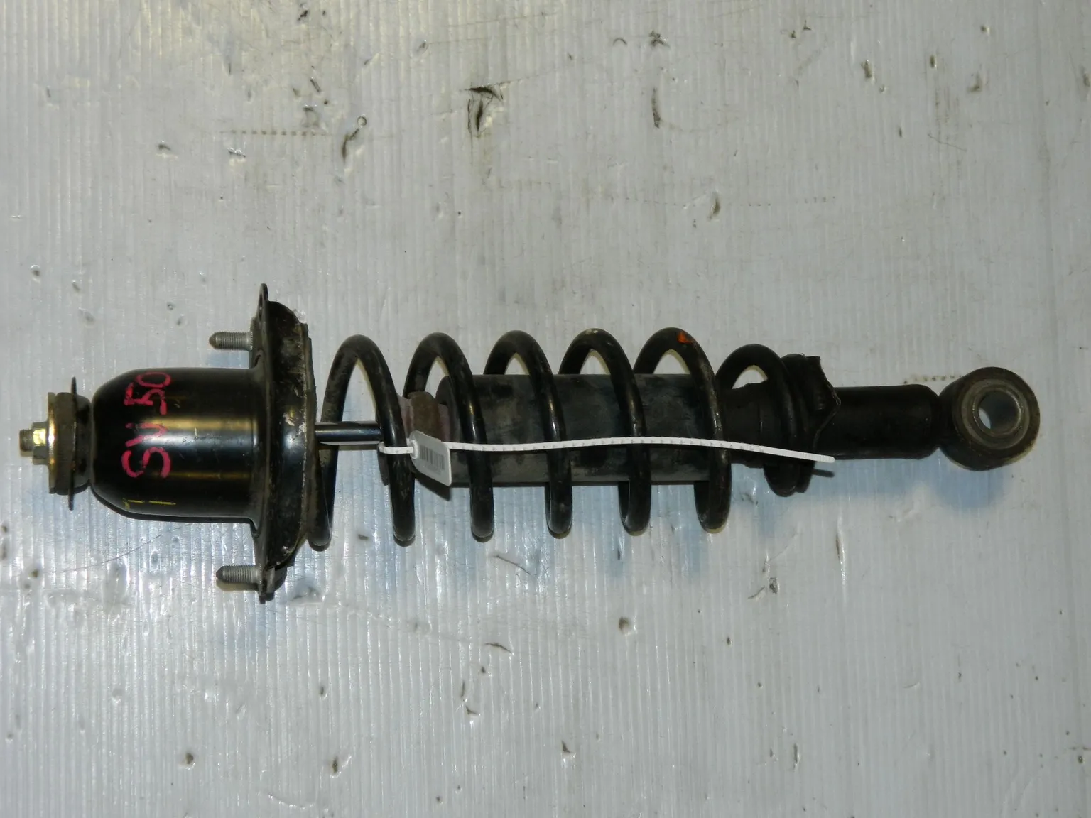 Стойка подвески TOYOTA VISTA SV50 Зад Лев (Контрактный)