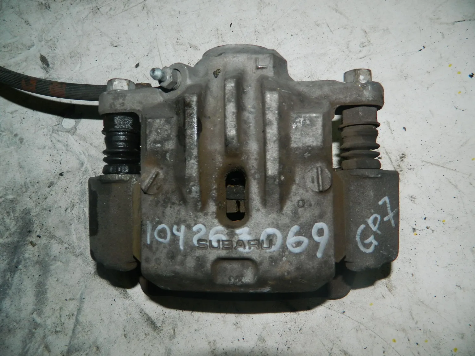 Суппорт SUBARU XV GP7 Зад Лев (Контрактный) 104263069