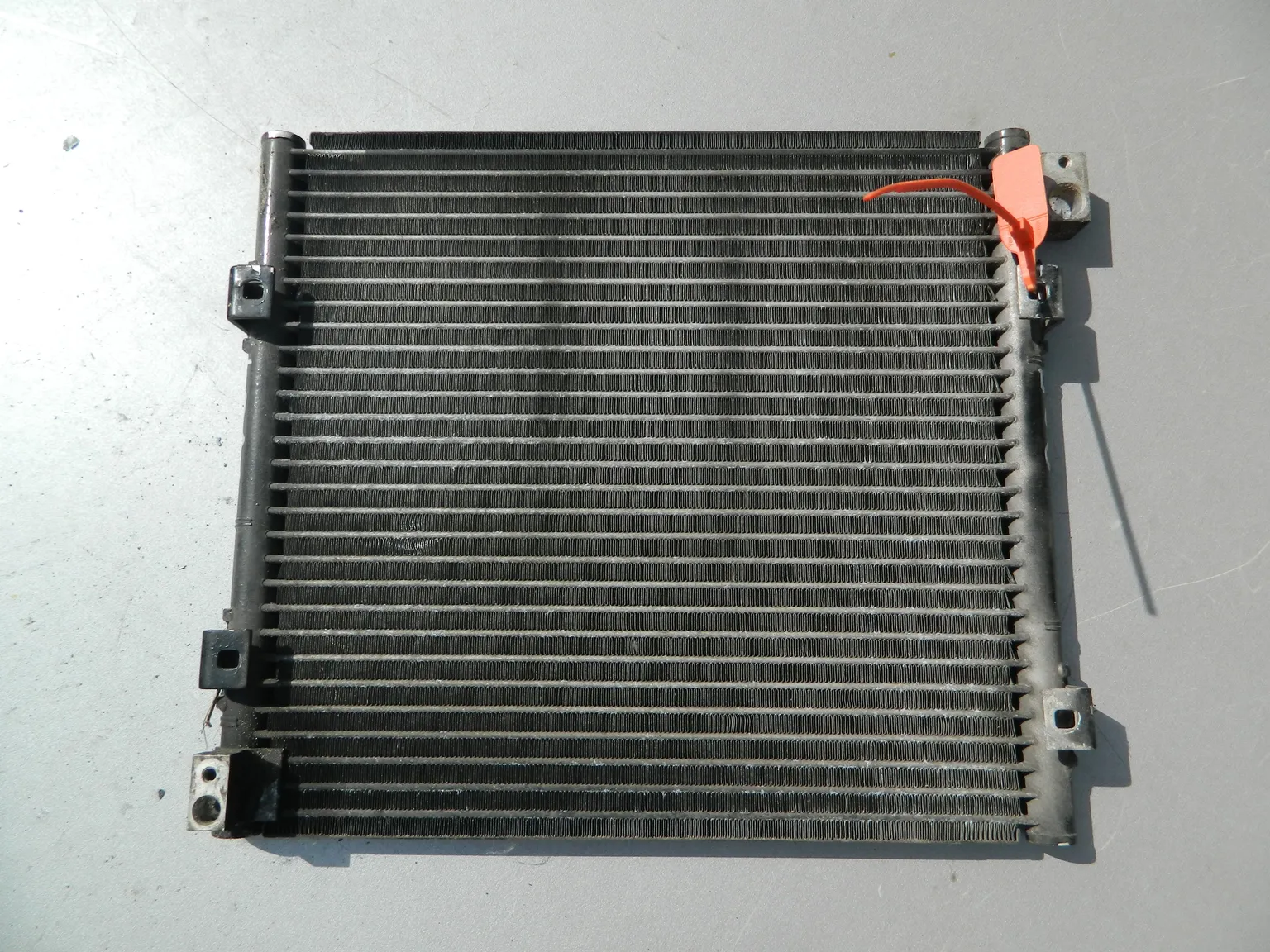 Радиатор кондиционера HONDA LOGO GA3 (Контрактный) 72367774