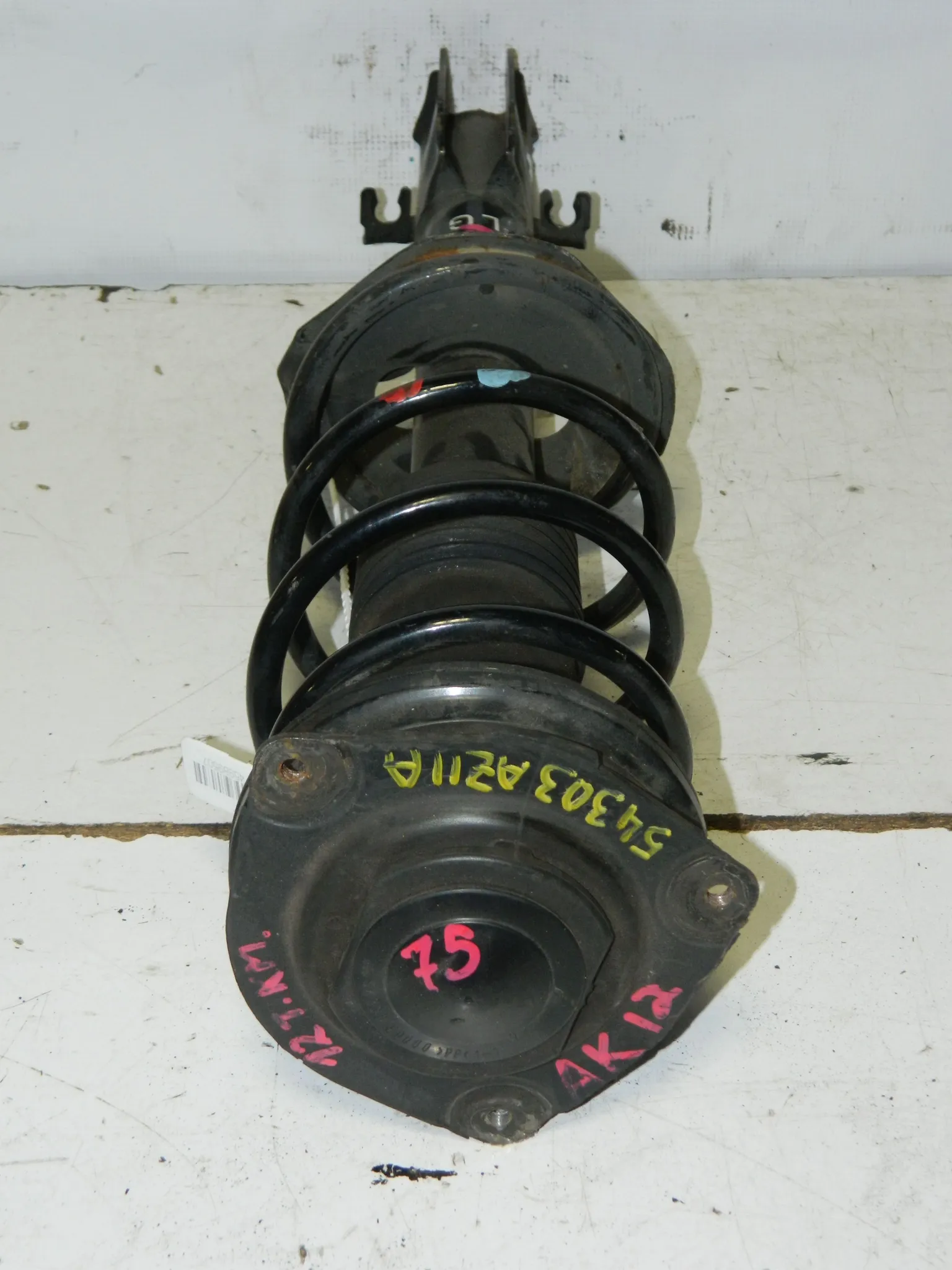 Стойка подвески NISSAN MARCH AK12 Перед Лев (Контрактный) 45989507