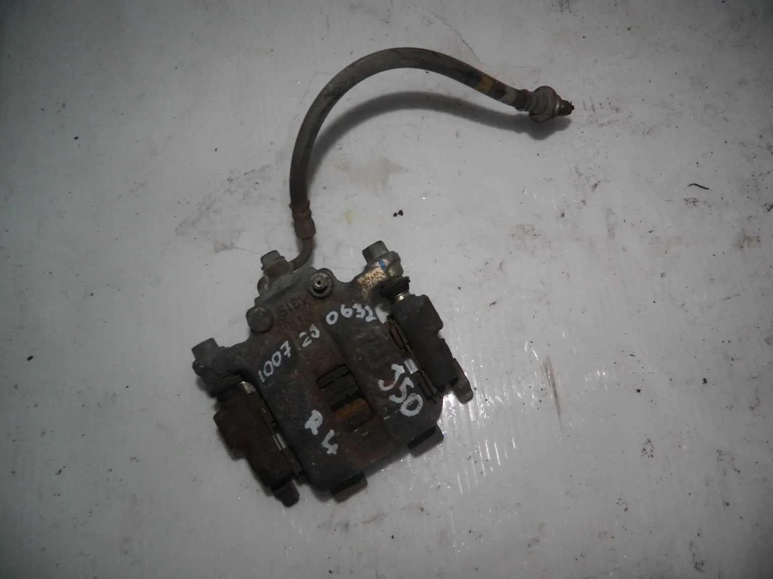 Суппорт INFINITI EX35 J50 Зад Лев (Контрактный) 1007200632