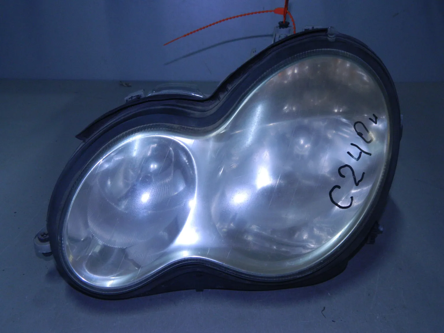 Фара MERCEDES-BENZ C-Class W203 Перед Лев (Контрактный) 65243387