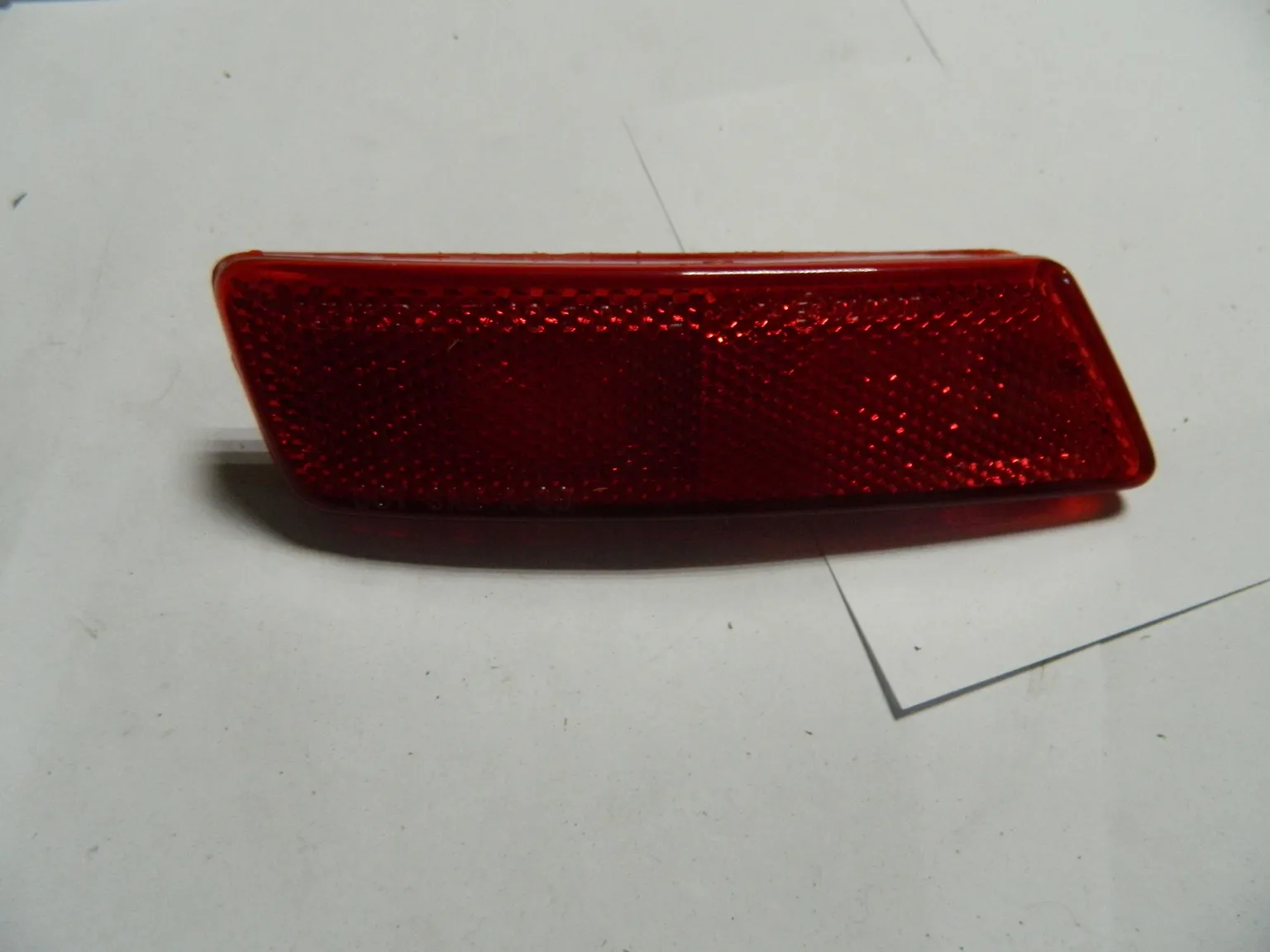 Отражатель в бампер NISSAN 265658H300