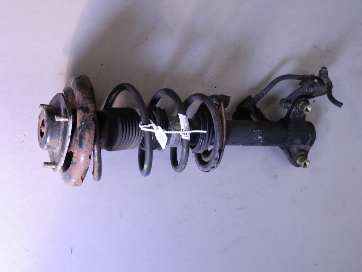 Стойка подвески NISSAN PRIMERA P12 Перед Прав (Контрактный) 68000050