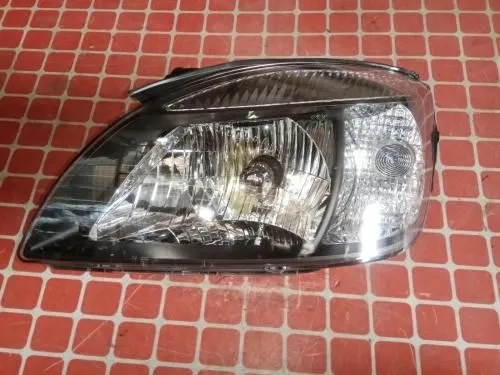 Фара KIA RIO JB JH03RI005001B2L Перед Лев 921011G620