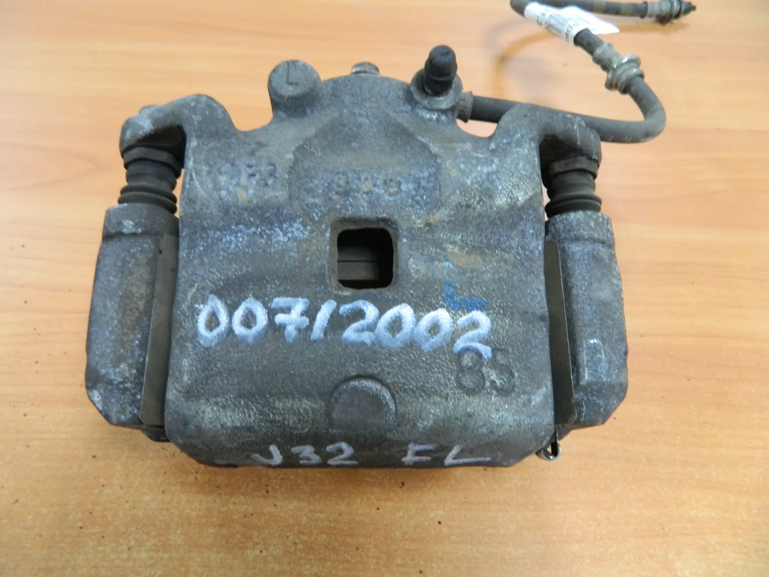 Суппорт NISSAN TEANA PJ32 Перед Лев (Контрактный)