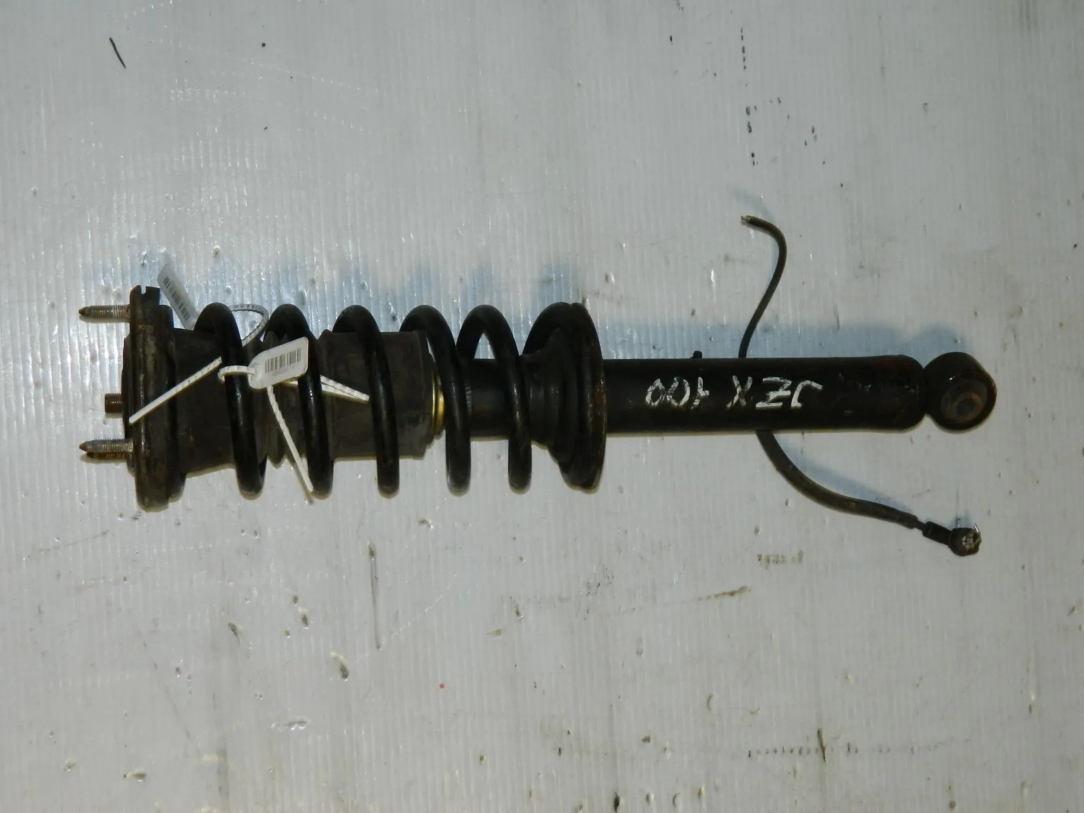 Стойка подвески TOYOTA MARK II JZX100 Перед Лев (Контрактный) 45989174