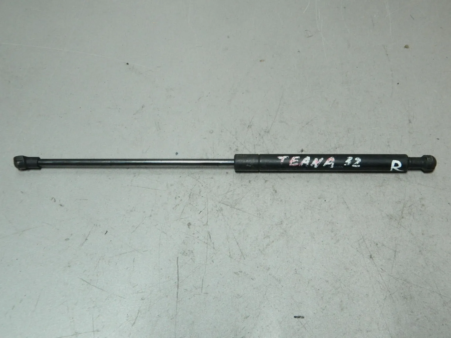 Амортизатор капота NISSAN TEANA J31 Прав (Контрактный) 81532131