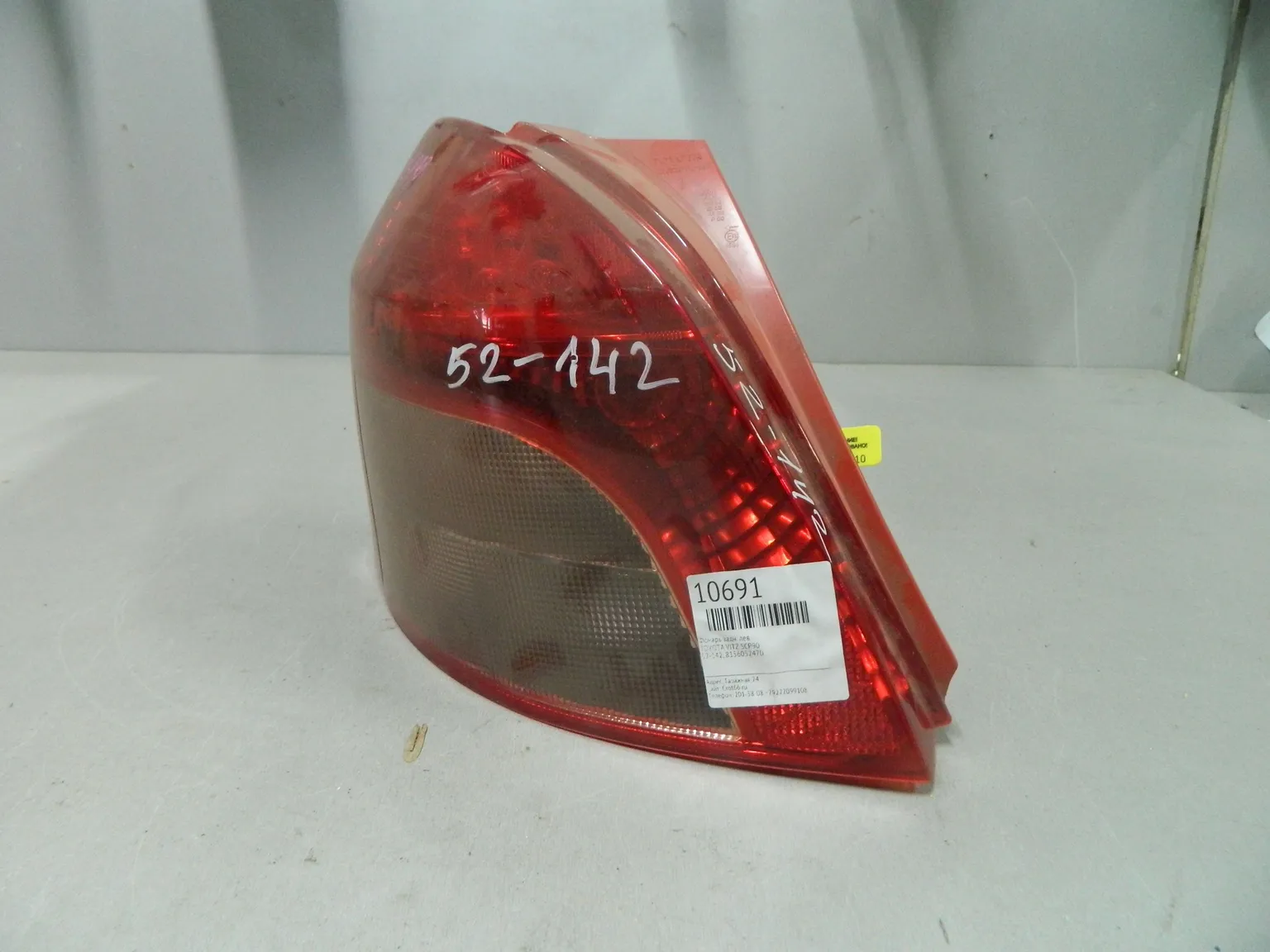 Фонарь TOYOTA VITZ KSP90 Зад Лев 52142 (Контрактный) 64492510