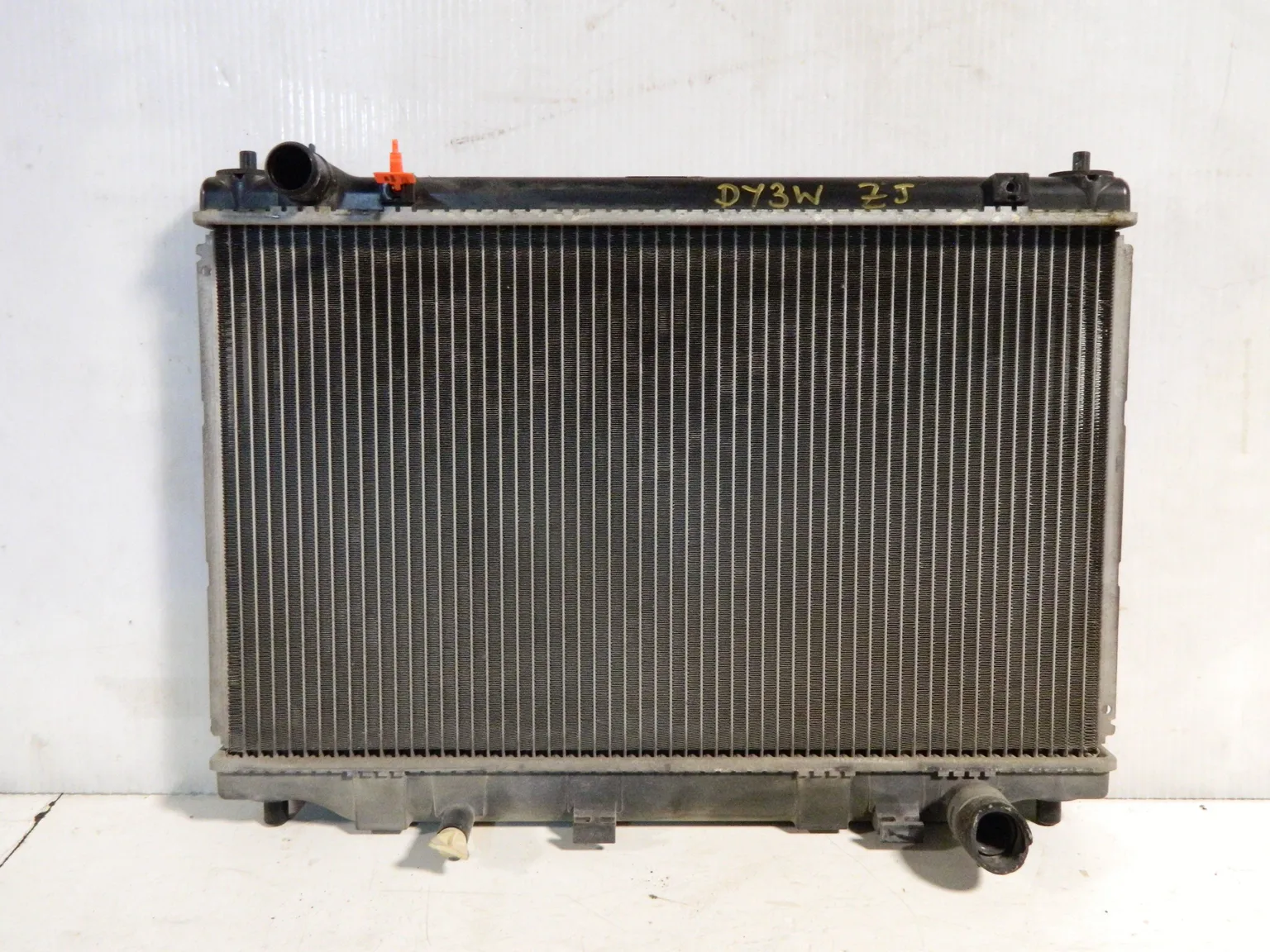 Радиатор ДВС MAZDA DEMIO DY3W (Контрактный) 65243419