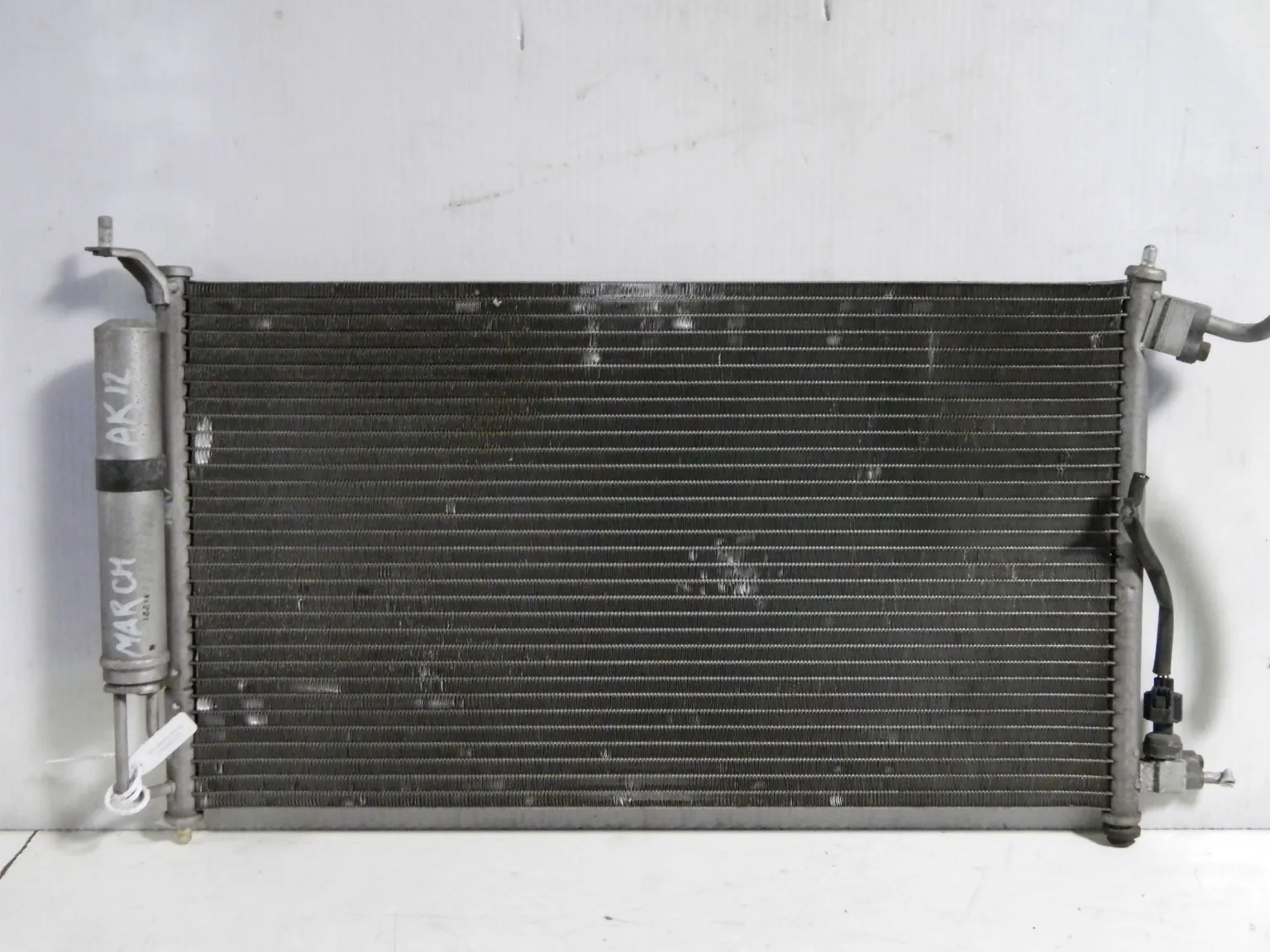 Радиатор кондиционера NISSAN MARCH AK12 (Контрактный) 69586572