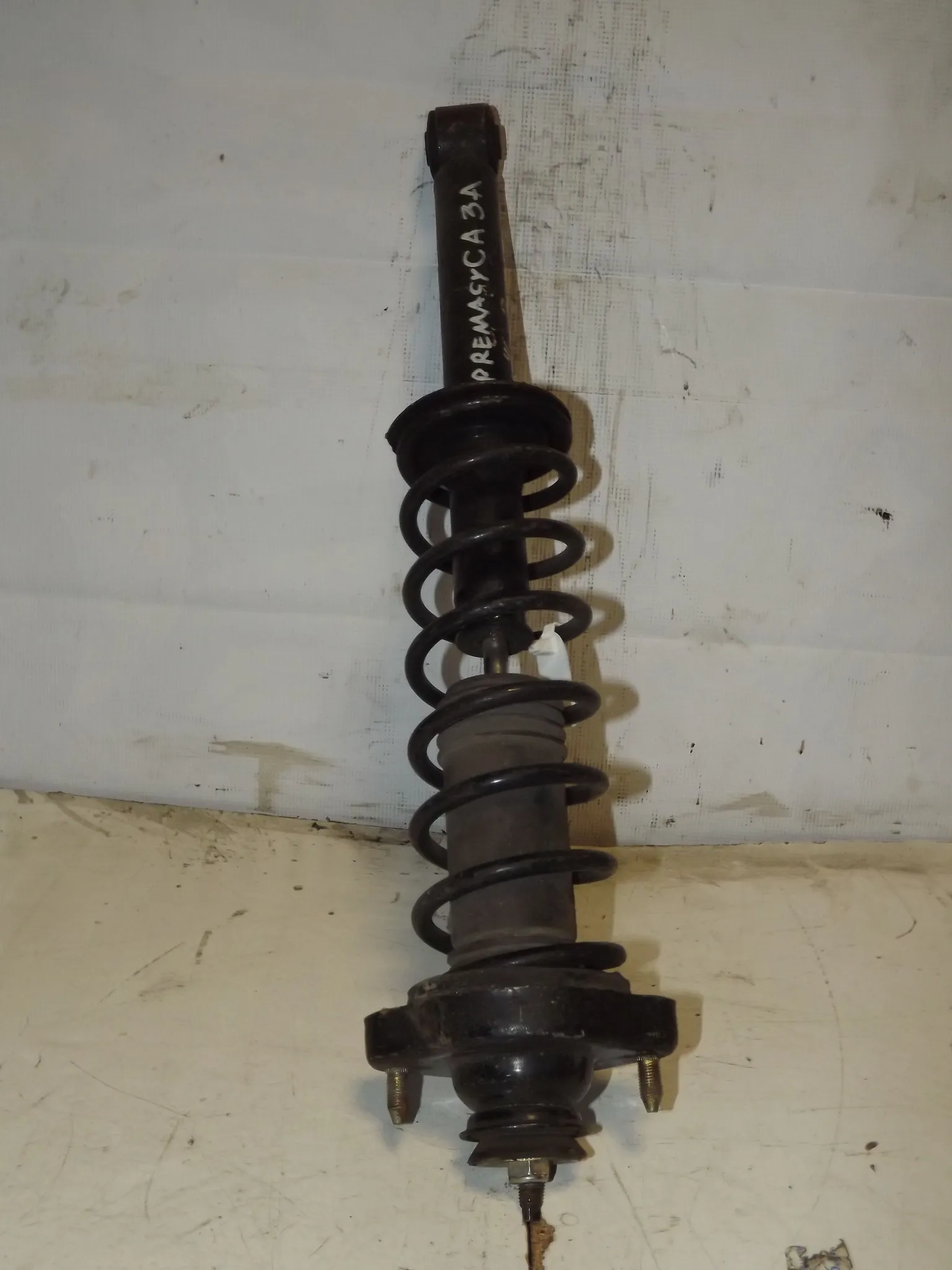 Стойка подвески MITSUBISHI MIRAGE CA3A Зад (Контрактный) 35023529 MR197611