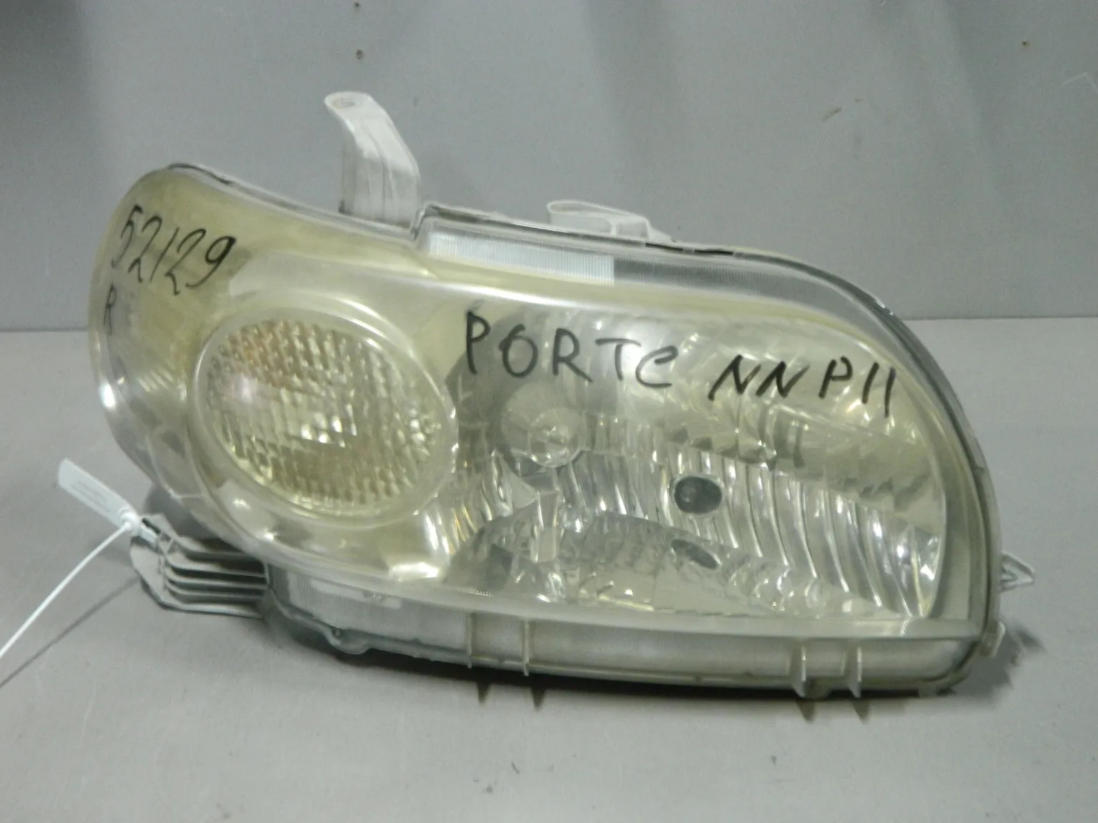 Фара TOYOTA PORTE NNP10 Перед Прав 52129 (Контрактный) 03344824