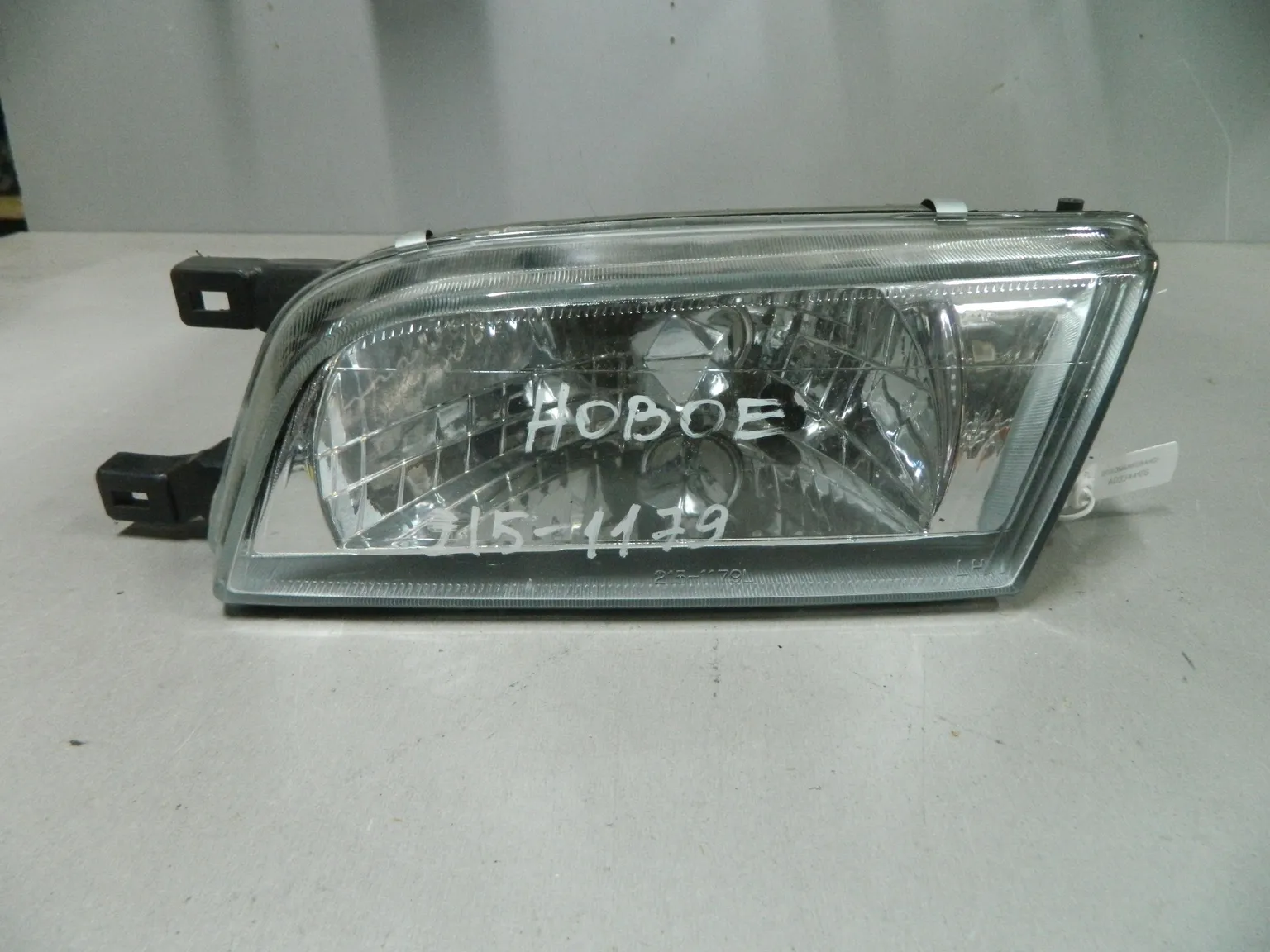 Фара NISSAN SUNNY B14 Перед Лев (Новый) 03344166