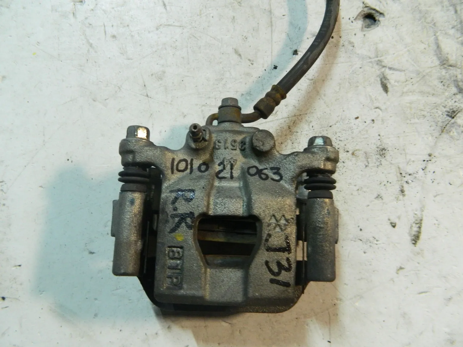 Суппорт NISSAN TEANA J31 Зад Прав (Контрактный) 101021063