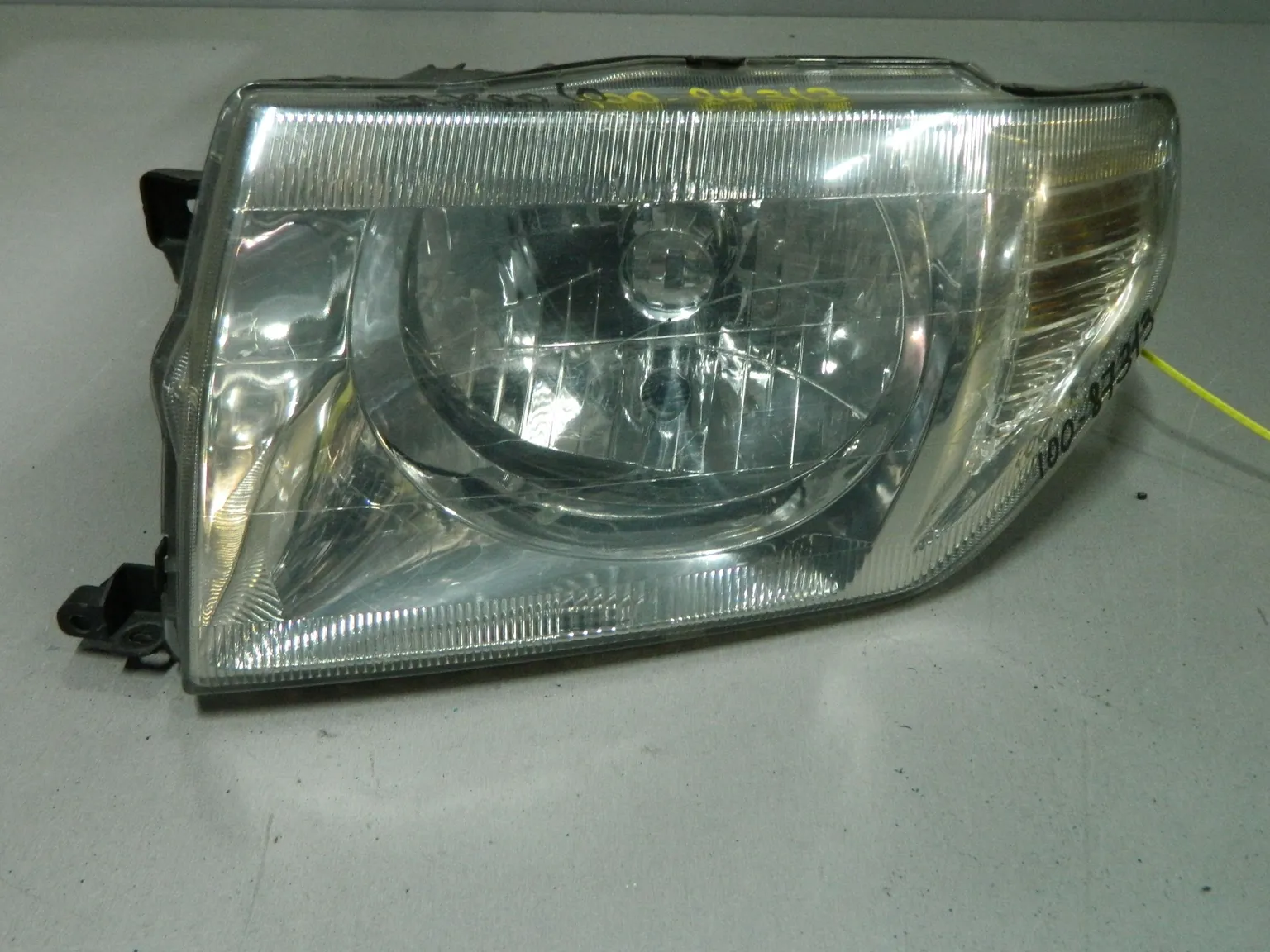 Фара MITSUBISHI PAJERO IO H76W Перед Лев (Контрактный) 64492394